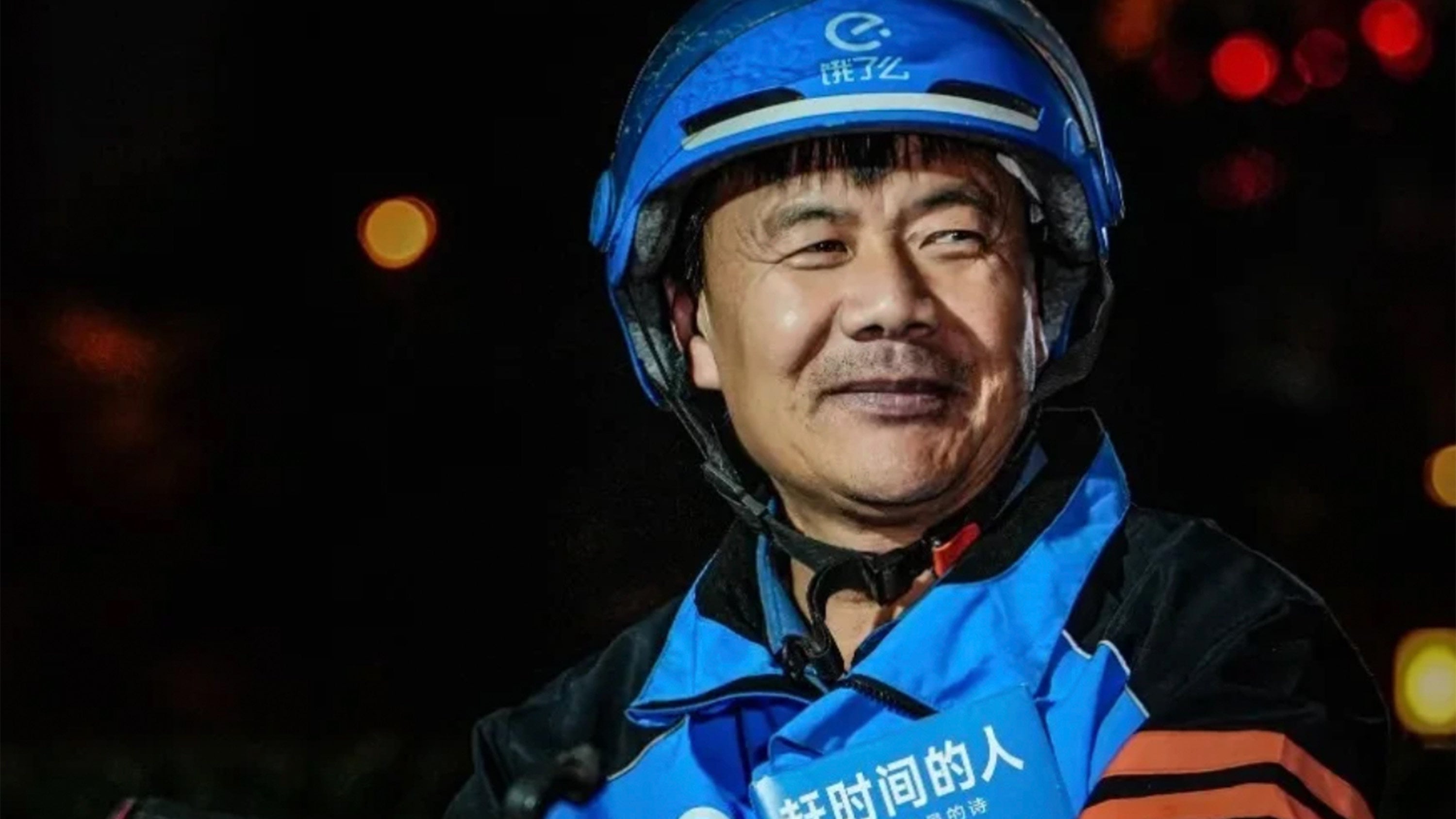 Wang Jibing, 56, known as the “delivery rider poet,” writes verses on scrap paper during breaks and has recently won the Lu Xun Literature Prize. Photo: Baidu
