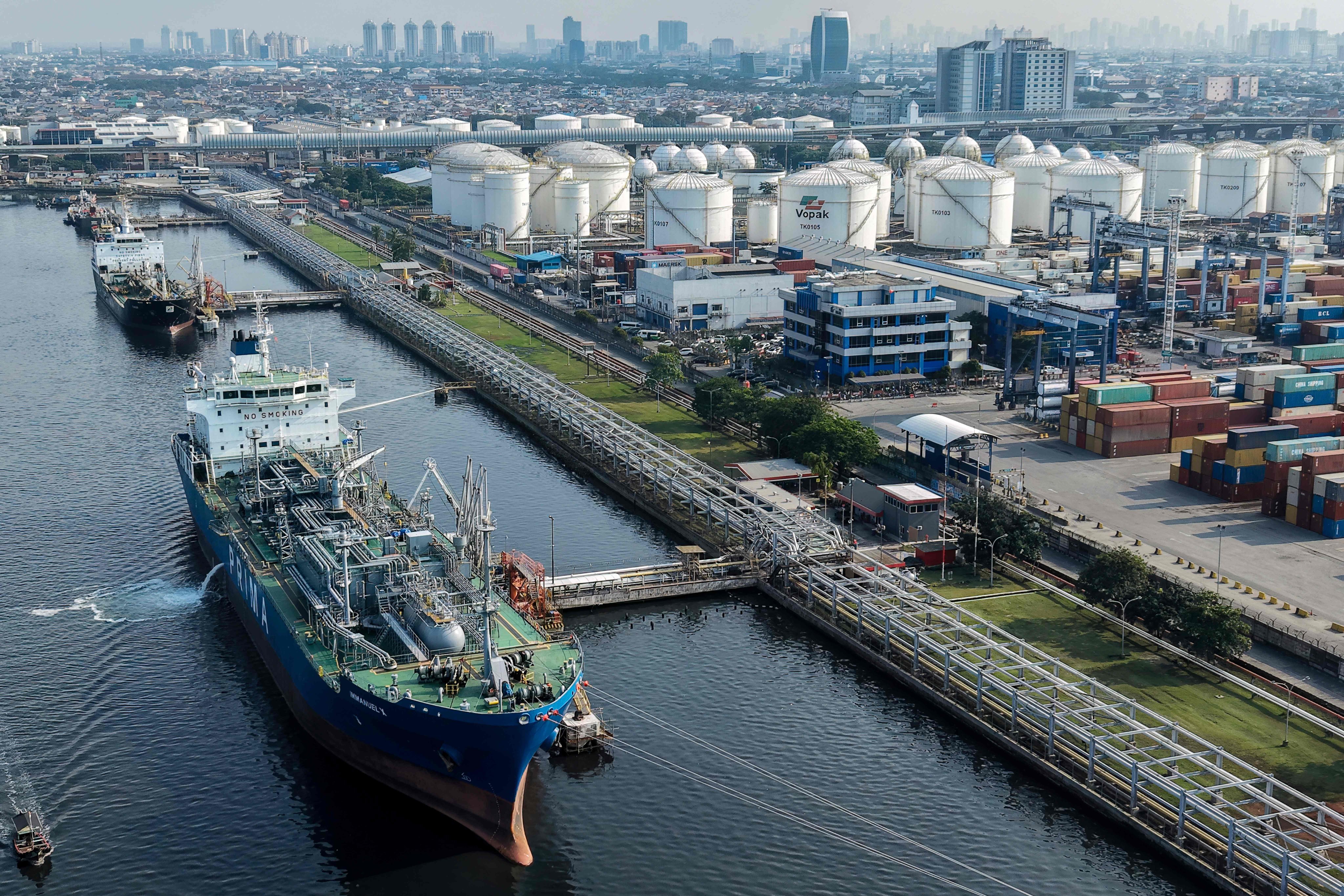 Tankers and cargo ships at the oil depot and container terminal of Tanjung Priok Port in Jakarta. Photo: AFP