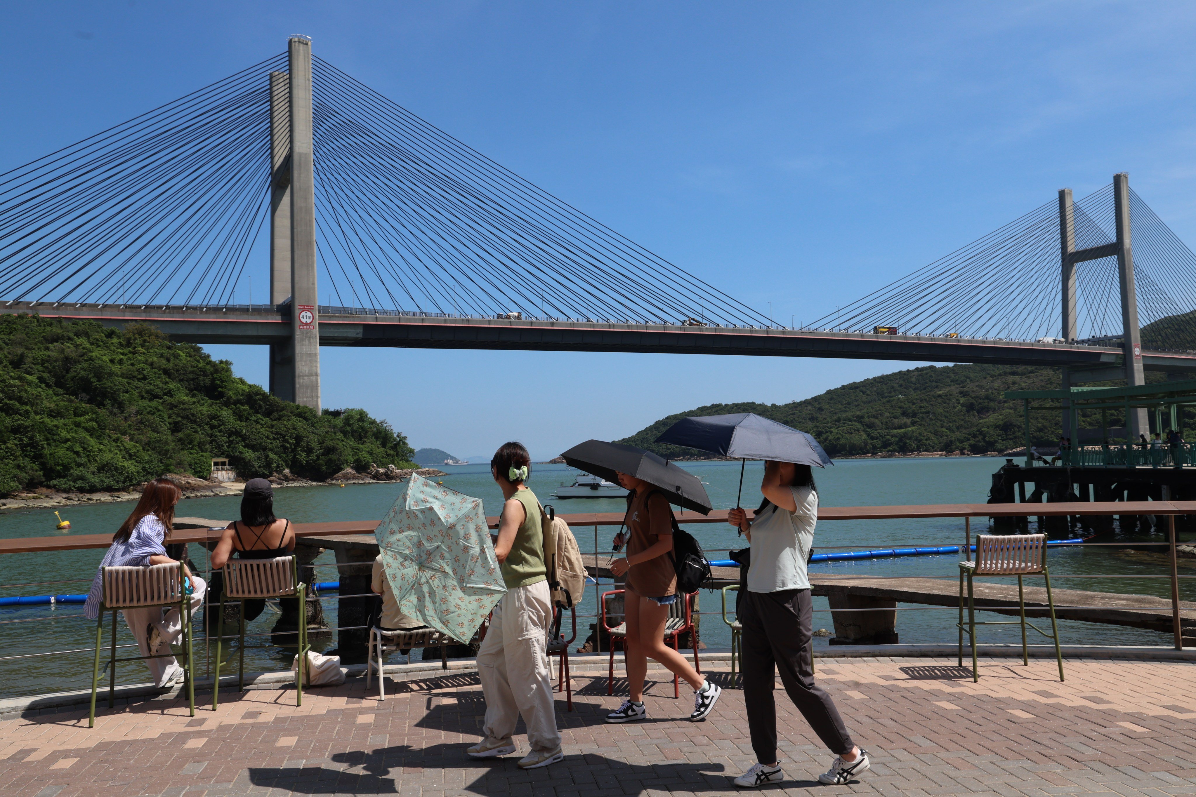 Visitors look out towards Ting Ma Bridge on Ma Wan island. Photo: Dickson Lee
