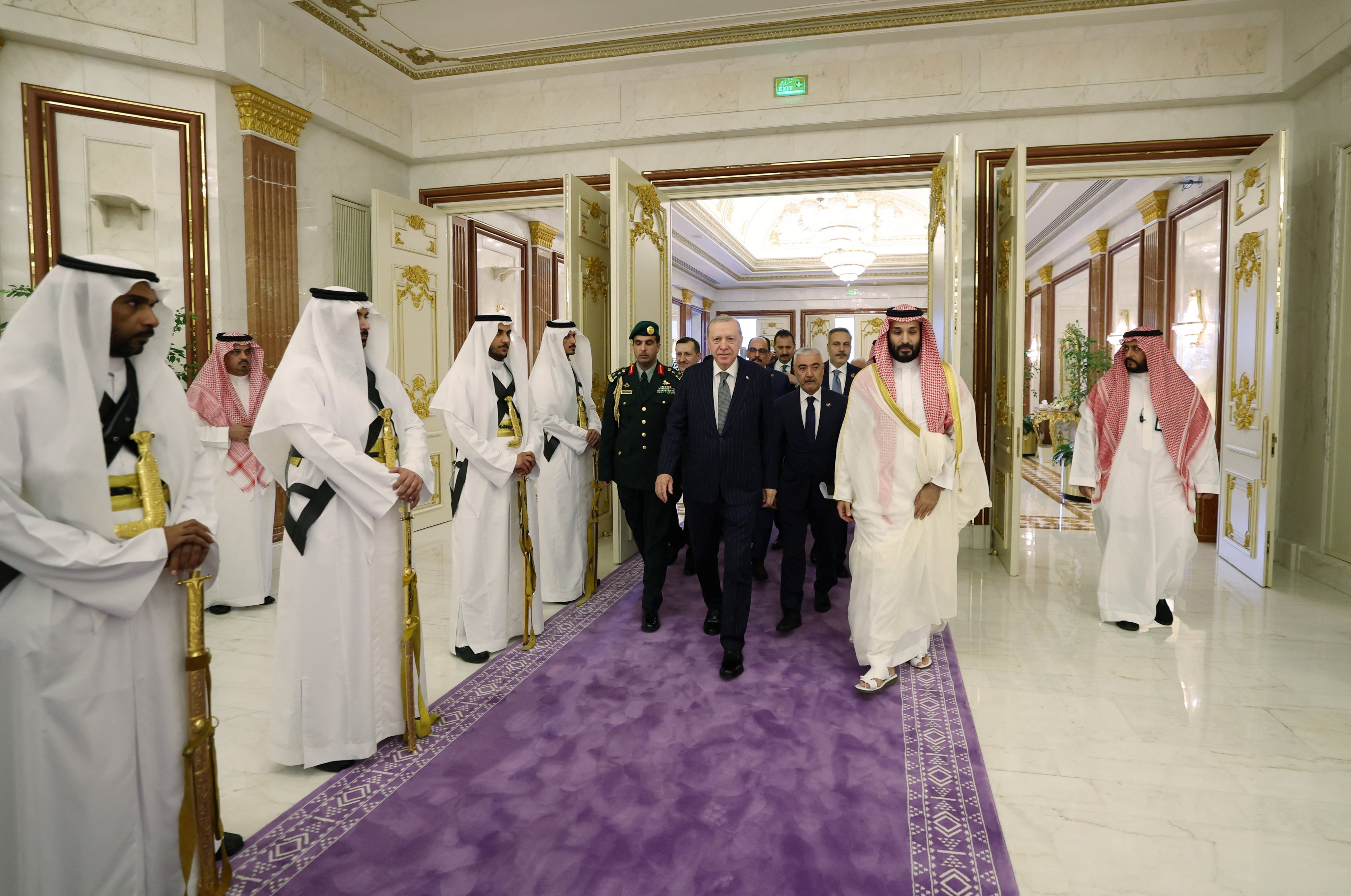 Turkish President Tayyip Erdogan is welcomed by Saudi Crown Prince Mohammed bin Salman, ahead of the signing of a defence deal between Saudi Arabia, Pakistan and Turkey, in Mecca, Saudi Arabia, on Friday. Photo: Turkish Presidential Press Office/Handout via Reuters