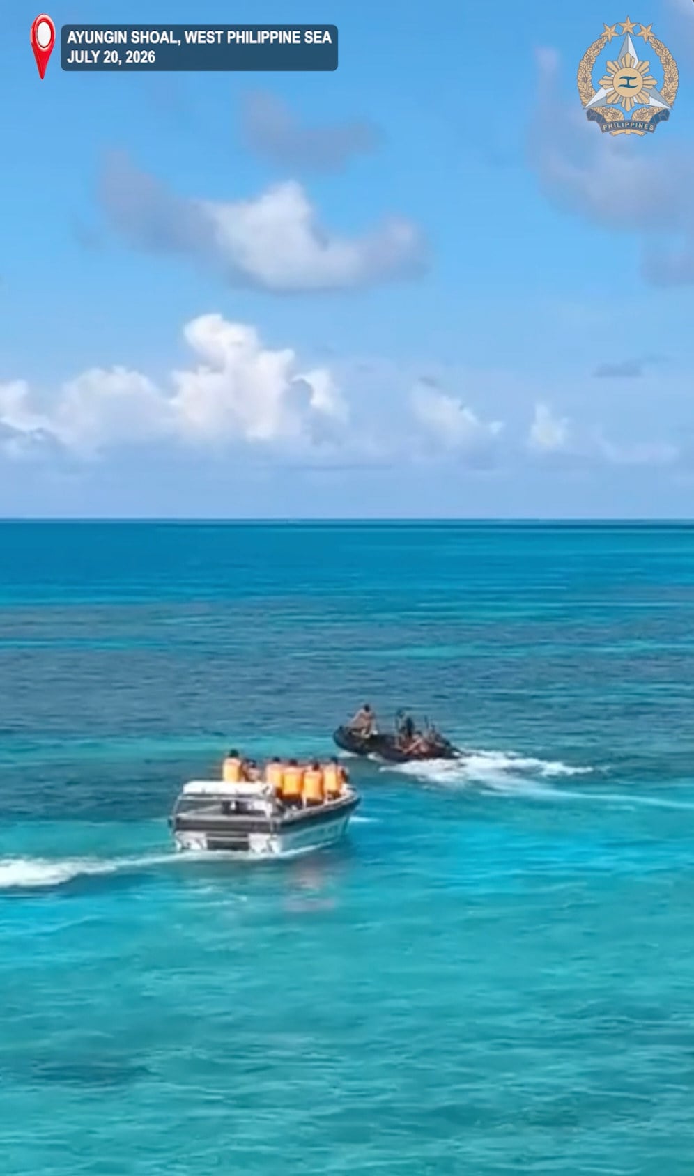 Chinese coastguard personnel on an inflatable boat chase Philippine Navy personnel aboard a rubber boat at the Second Thomas Shoal, locally known as Ayungin Shoal, in the South China Sea on July 20. Photo: Armed Forces of the Philippines/AP