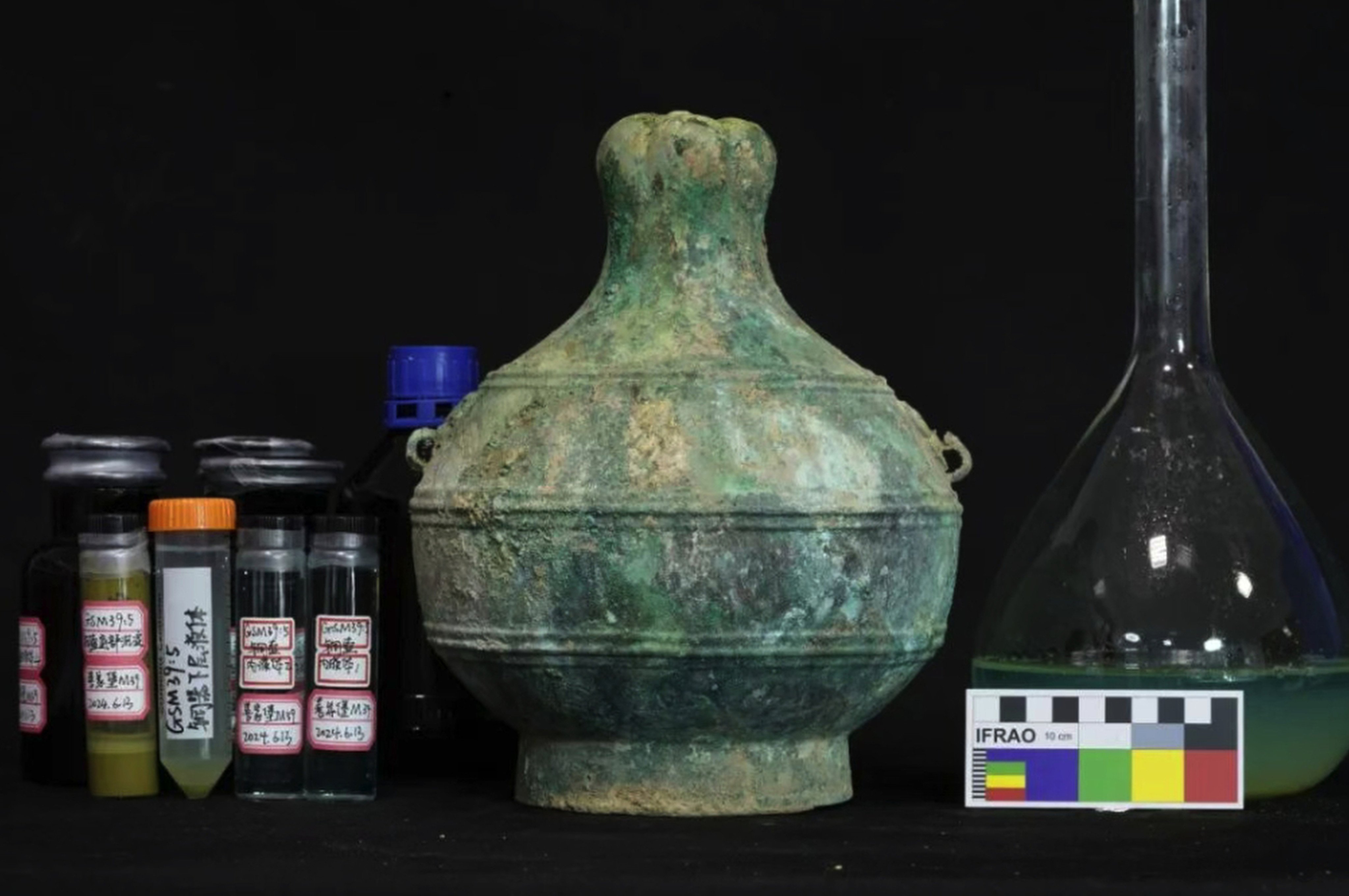 A well-preserved bronze Warring States-era wine vessel containing 2,300-year-old wine was discovered at the Shanjiabao cemetery. Here it is pictured in the lab. Photo: Handout