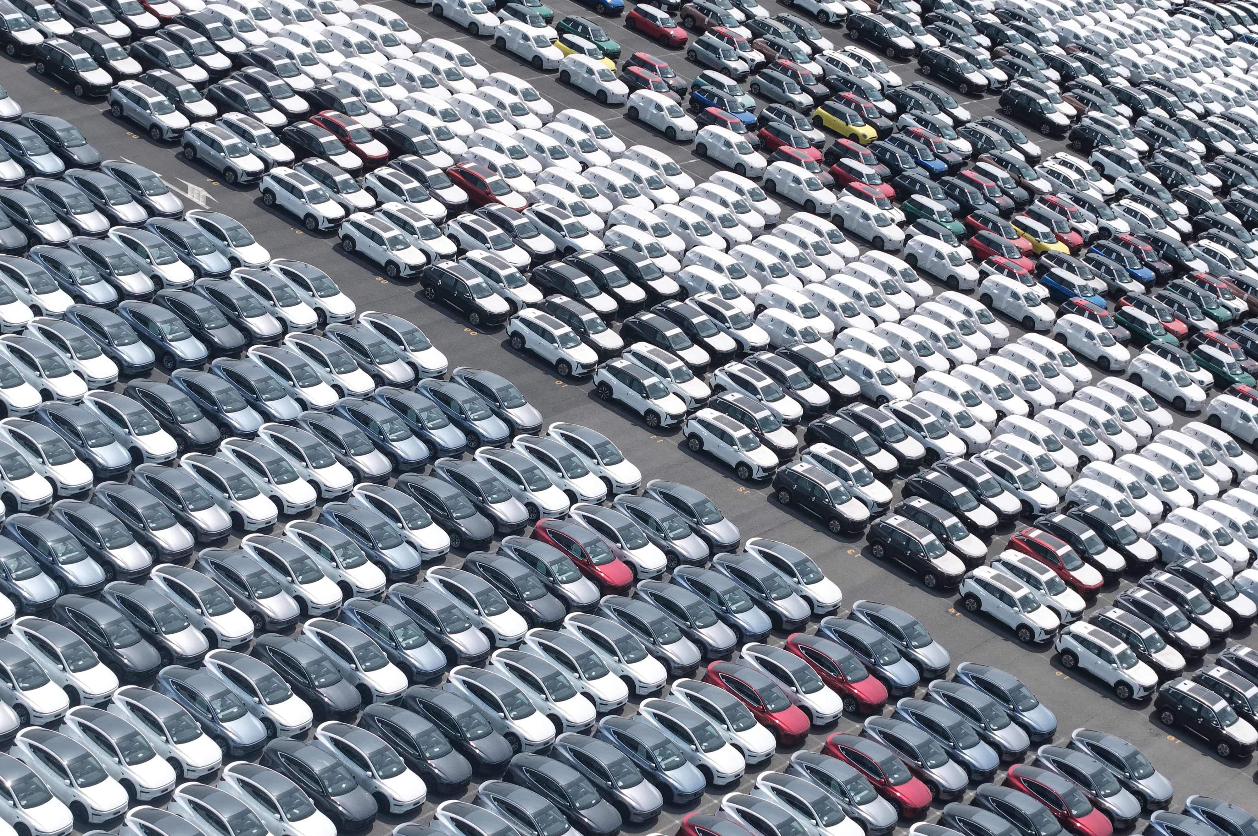 Cars for export including BYD, Cherry and SAIC models, are seen at Shanghai port in Shanghai on August 7, 2026. Photo: CN-STR/AFP