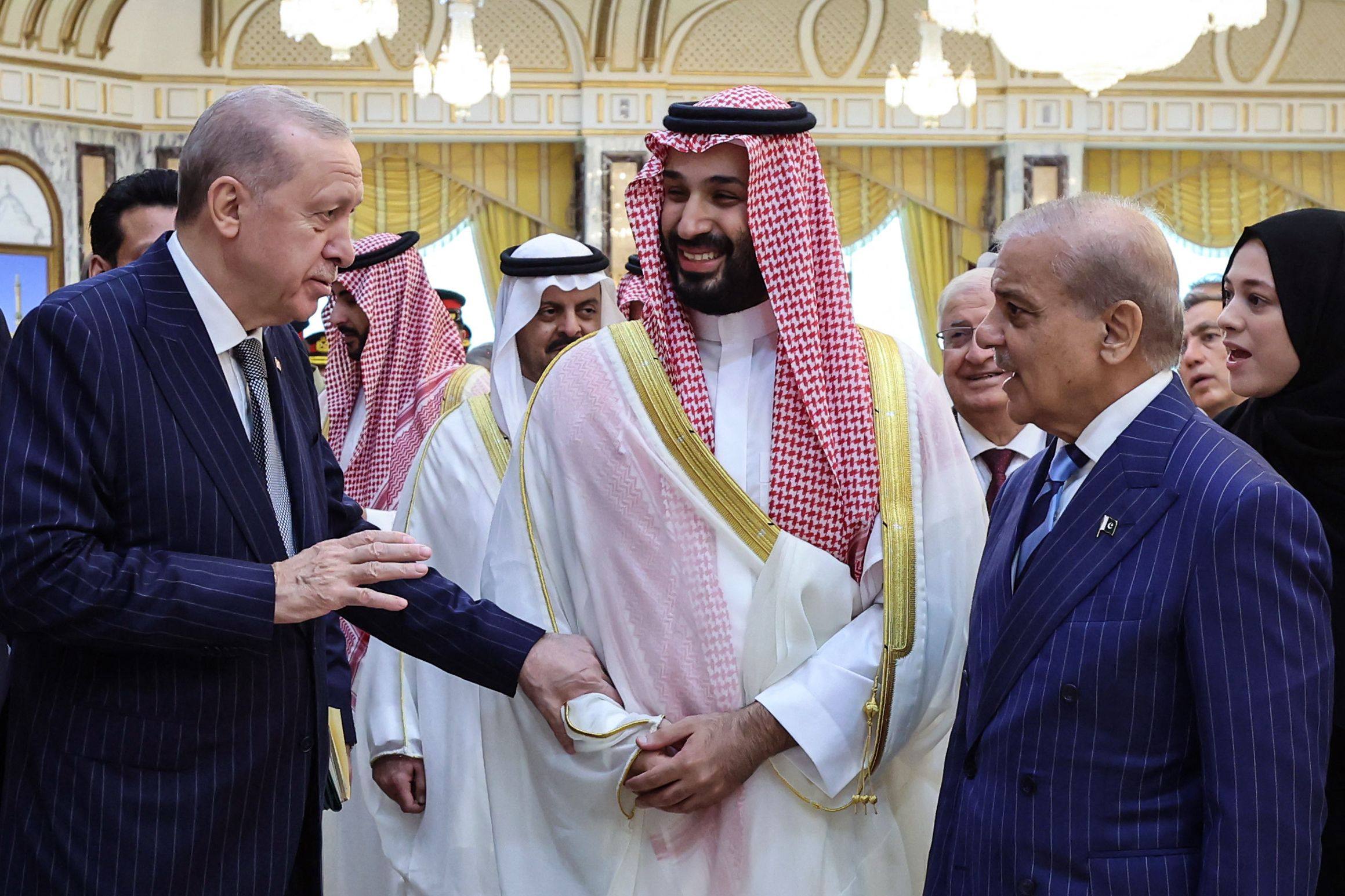 Turkey’s President Recep Tayyip Erdogan (left), Saudi Arabia’s Crown Prince Mohammed bin Salman (centre) and Pakistan’s Prime Minister Shehbaz Sharif meet in Mecca on Friday to sign a joint defence agreement. Photo Turkish Presidency Press/AFP