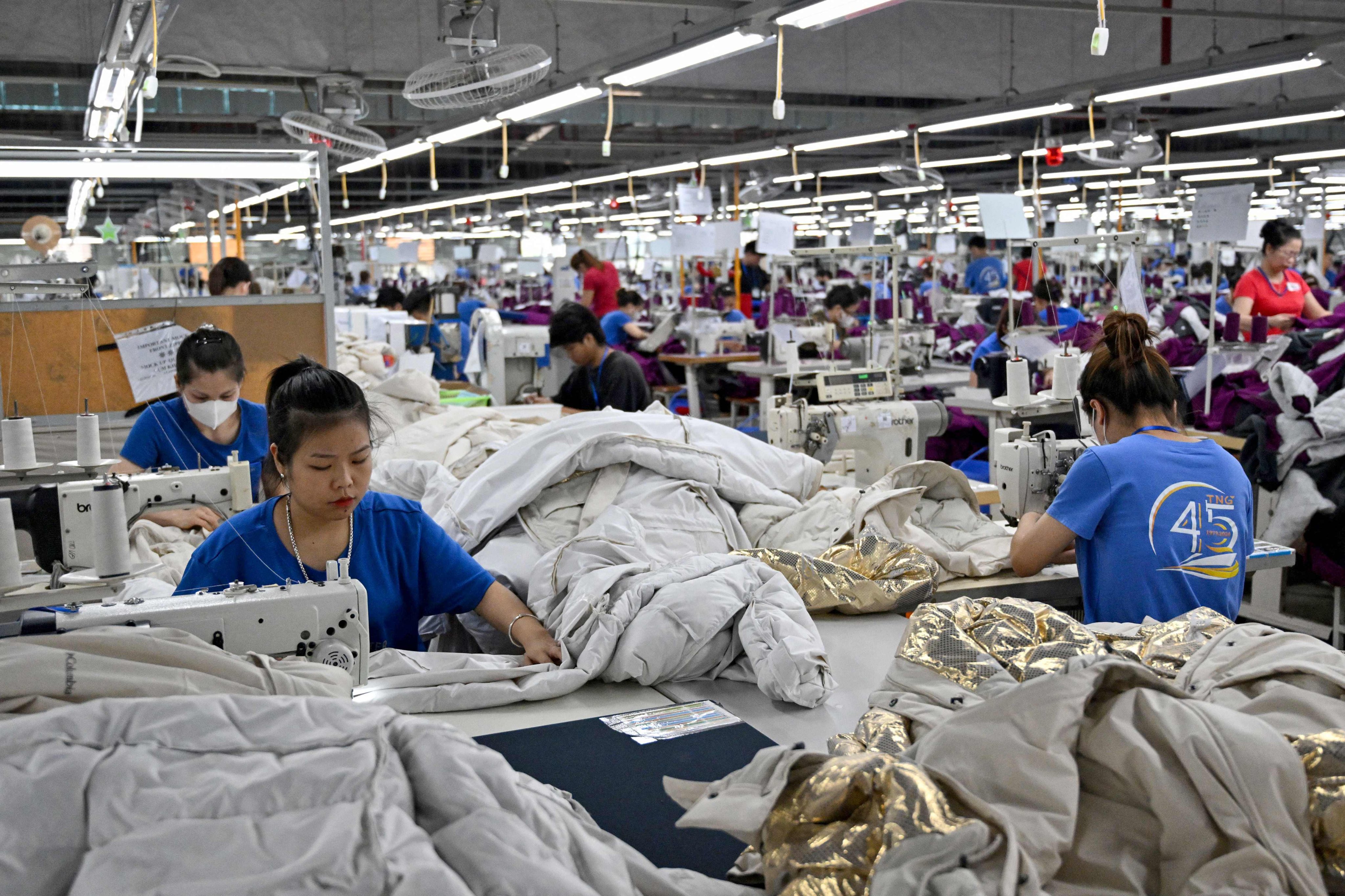 Workers stitch clothes at a garment factory in Vietnam’s Thai Nguyen province last year. Photo: AFP