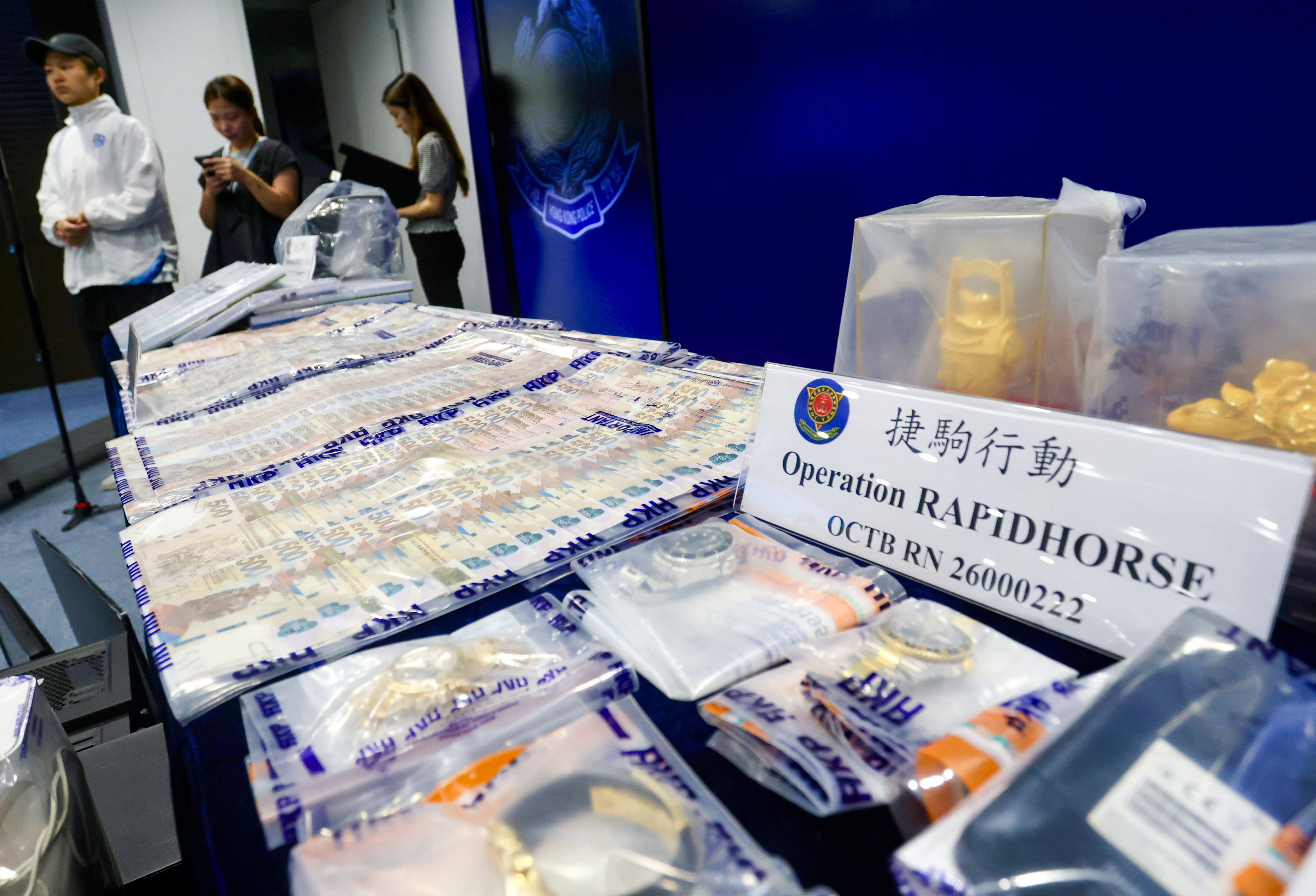 Police have arrested 147 people after uncovering a triad syndicate suspected of setting up centres to coordinate bank accounts. Photo: Jonathan Wong