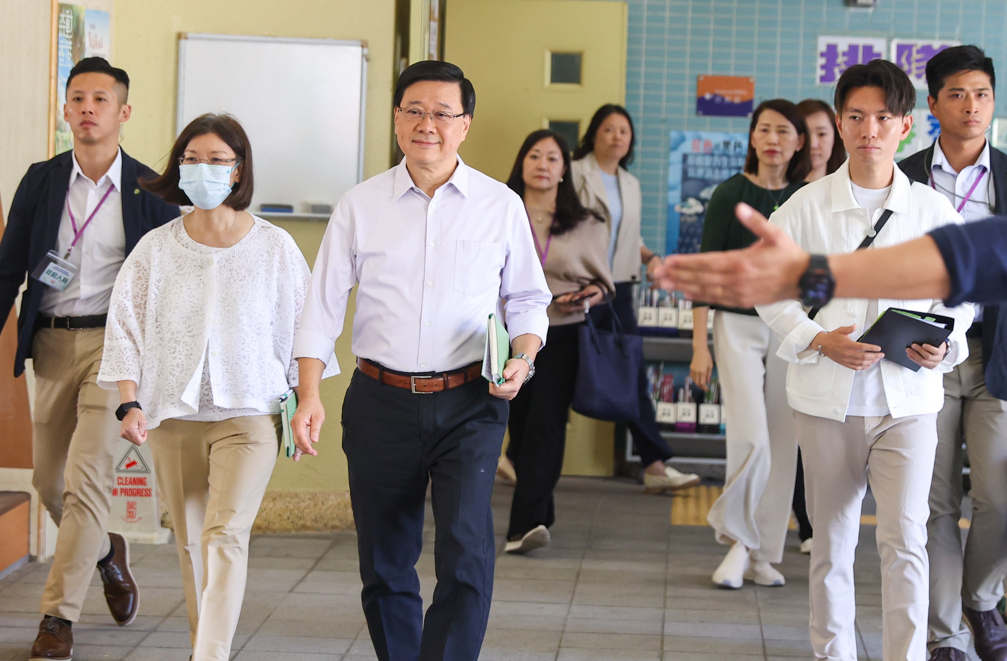 Chief Executive John Lee (centre) attends the second town hall on his policy address 2026 and Hong Kong’s first five-year plan. Photo: Edmond So