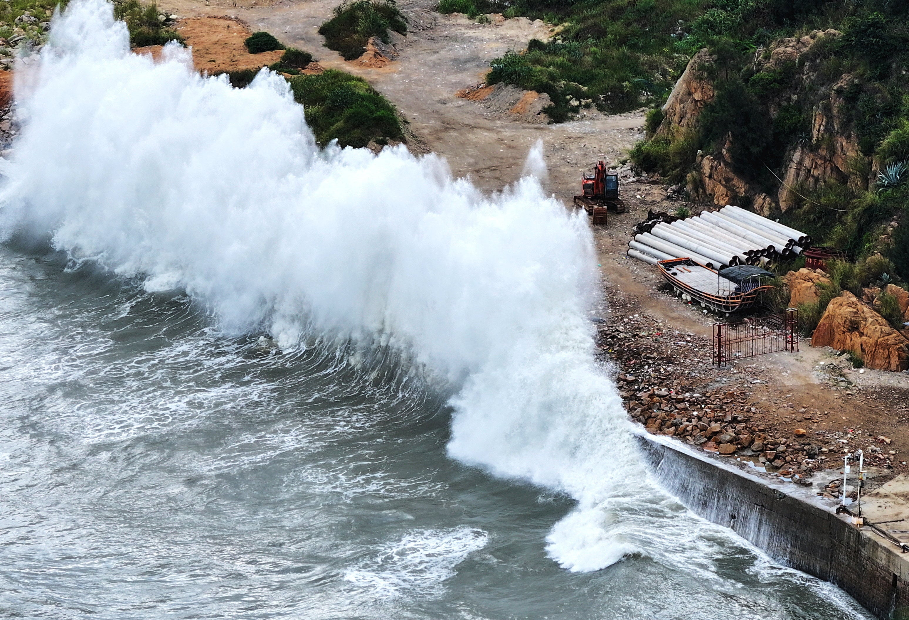 Huge waves crash into the coastline near Lianjiang county in Fujian province as Typhoon Dolphin approaches east China. Photo: via Reuters