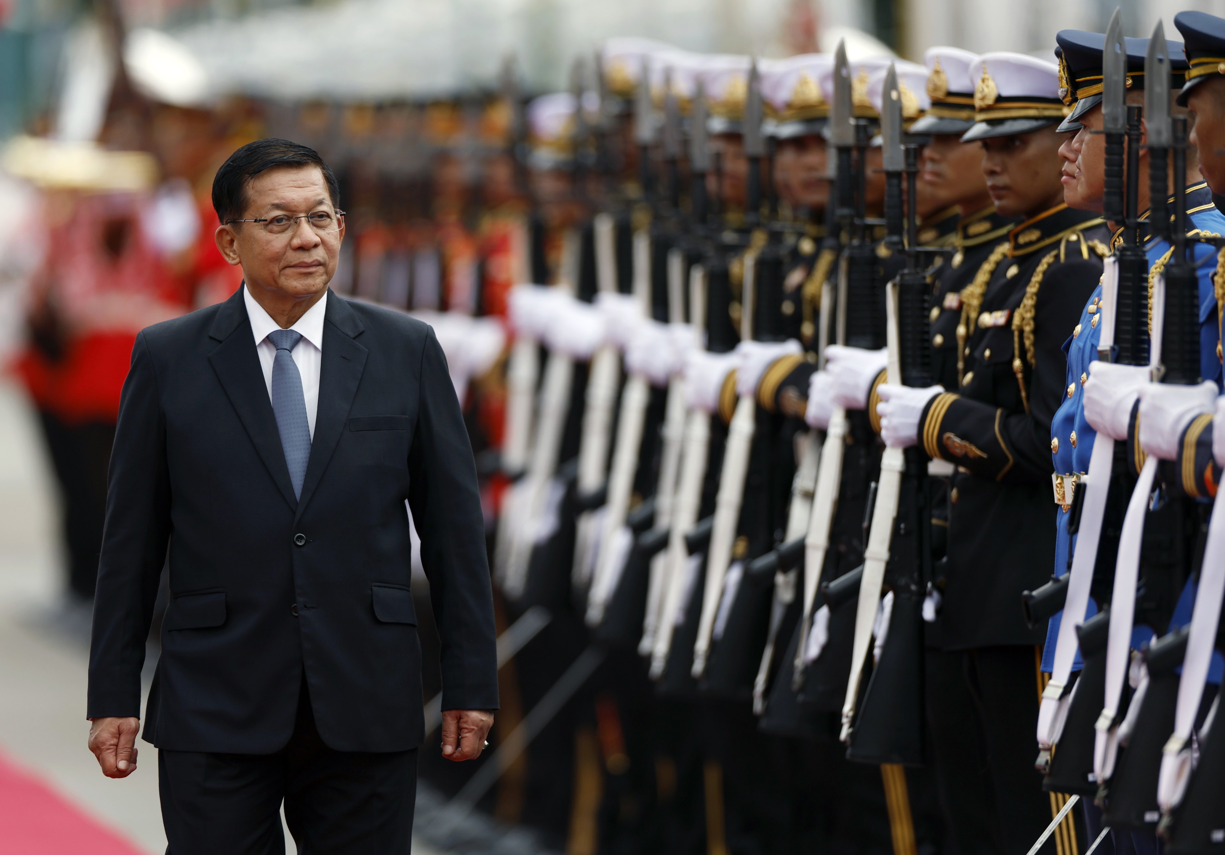 Myanmar President Min Aung Hlaing reviews the honour guard during a welcoming ceremony at Government House in Bangkok, Thailand on Thursday. Myanmar’s former army chief who had originally seized power in 2021 from Aung San Suu Kyi’s civilian government, has been trying to win political legitimacy since the takeover and resume relations with Asean. Photo: EPA
