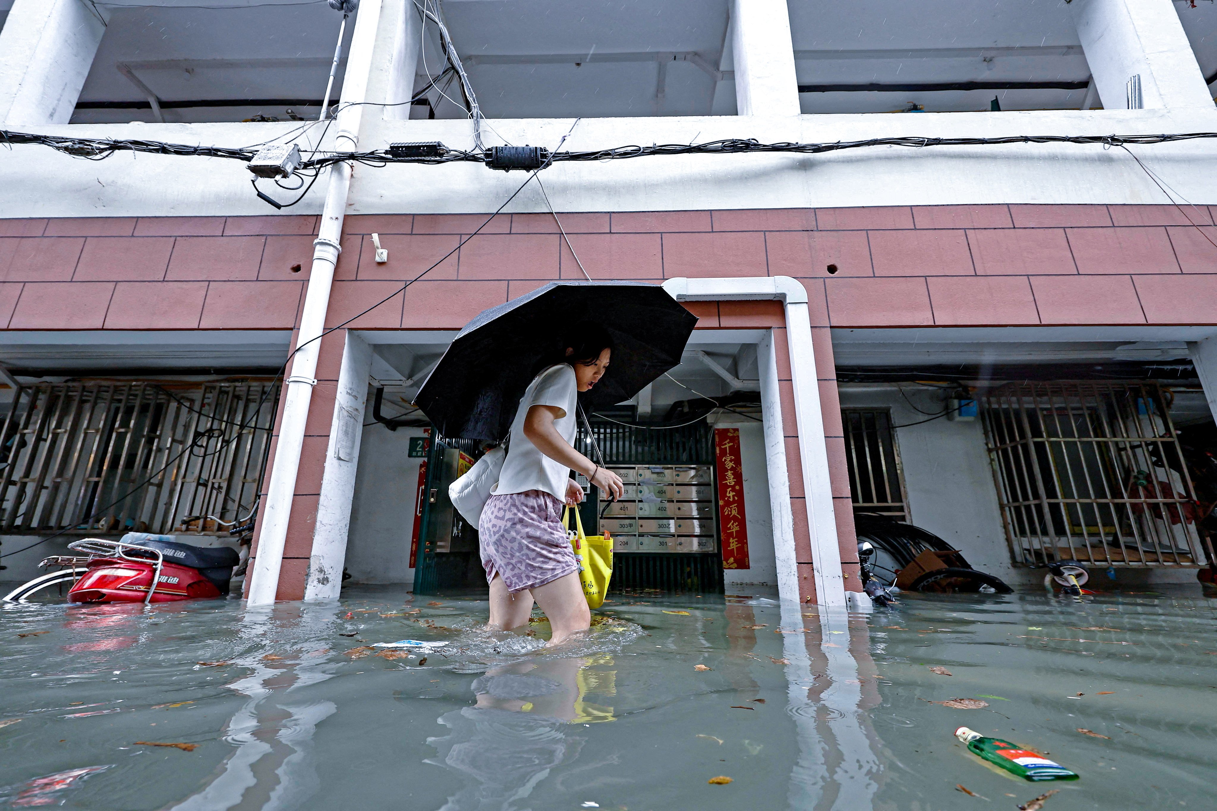 After causing flooding in Shanghai and other parts of eastern China, Typhoon Dolphin was expected to maintain its strength as it moved towards Beijing. Photo: Reuters