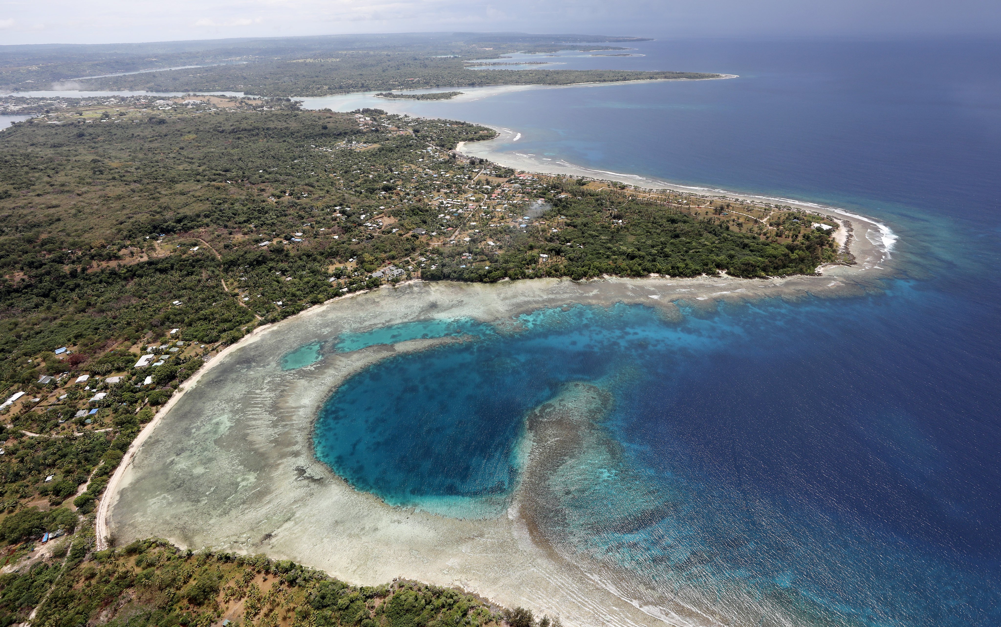 An aerial view of the coastline in Port Vila, Vanuatu, in December 2019. The Vanuatu government has called for a mechanism to assess gaps in scientific knowledge about deep-sea mining and progress towards filling them. Photo: Getty Images