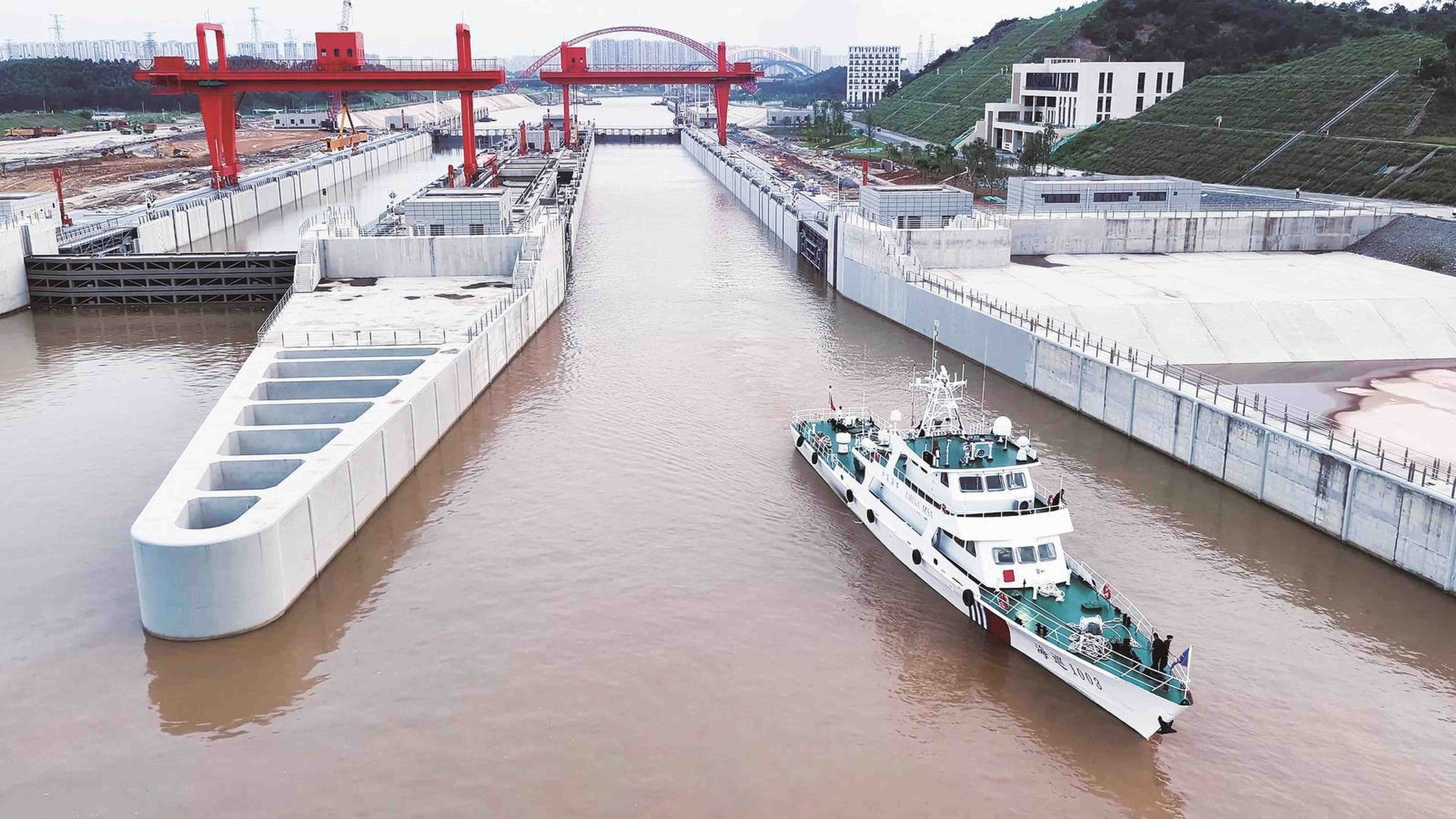 A Chinese maritime patrol vessel completes the first full navigation test of the Pinglu Canal. Photo: Handout