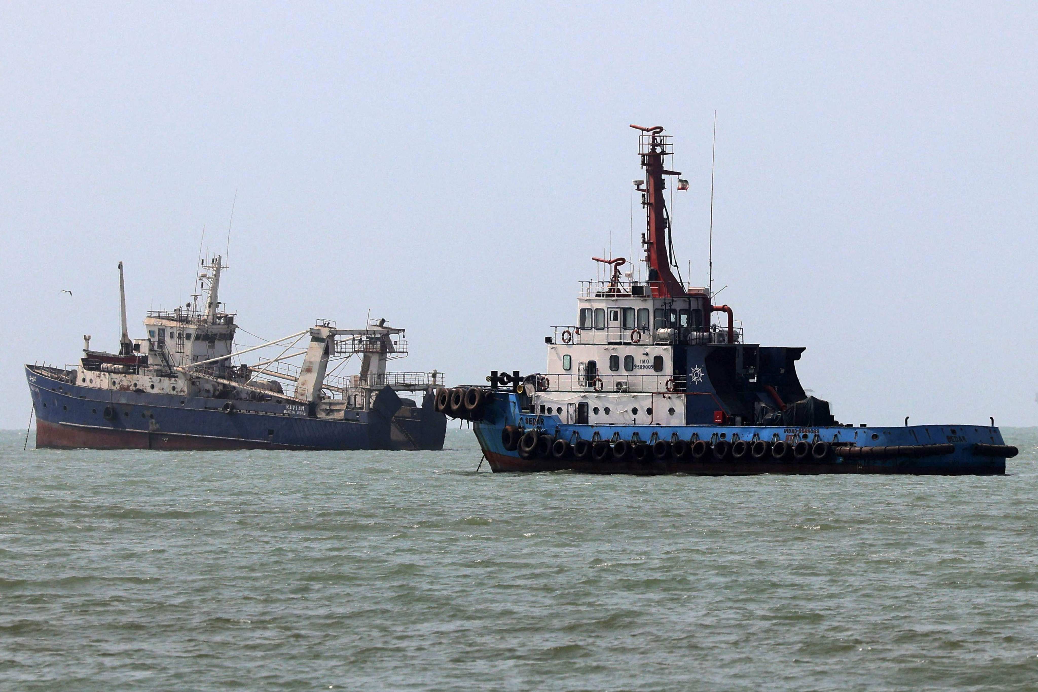 Vessels transit the Strait of Hormuz off Bandar Abbas in southern Iran on Monday. Photo: AFP