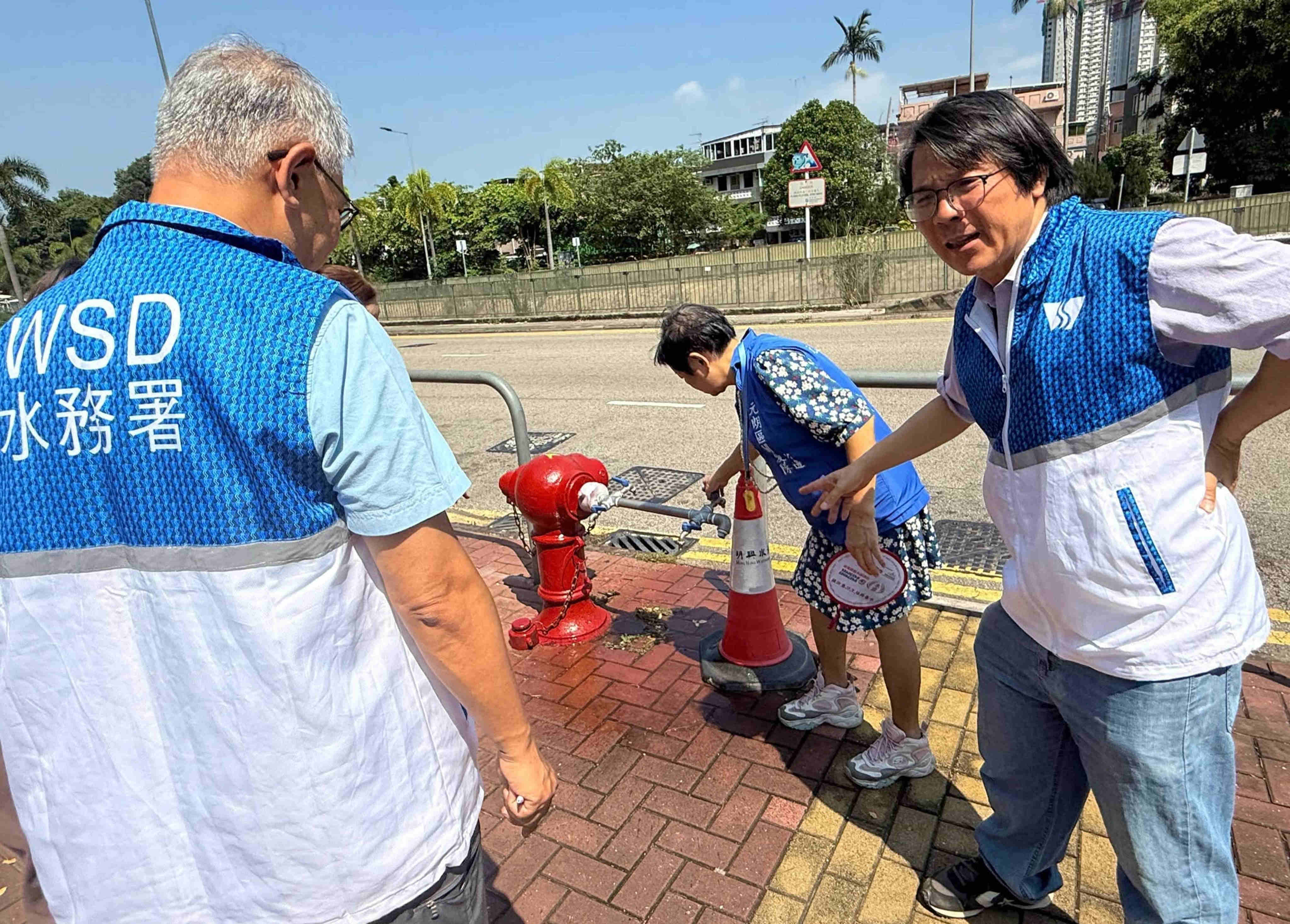 Employees from the Water Supplies Department were among those assembled in response to a power outage at Shui Pin Wai Estate in Yuen Long.  Photo: Handout