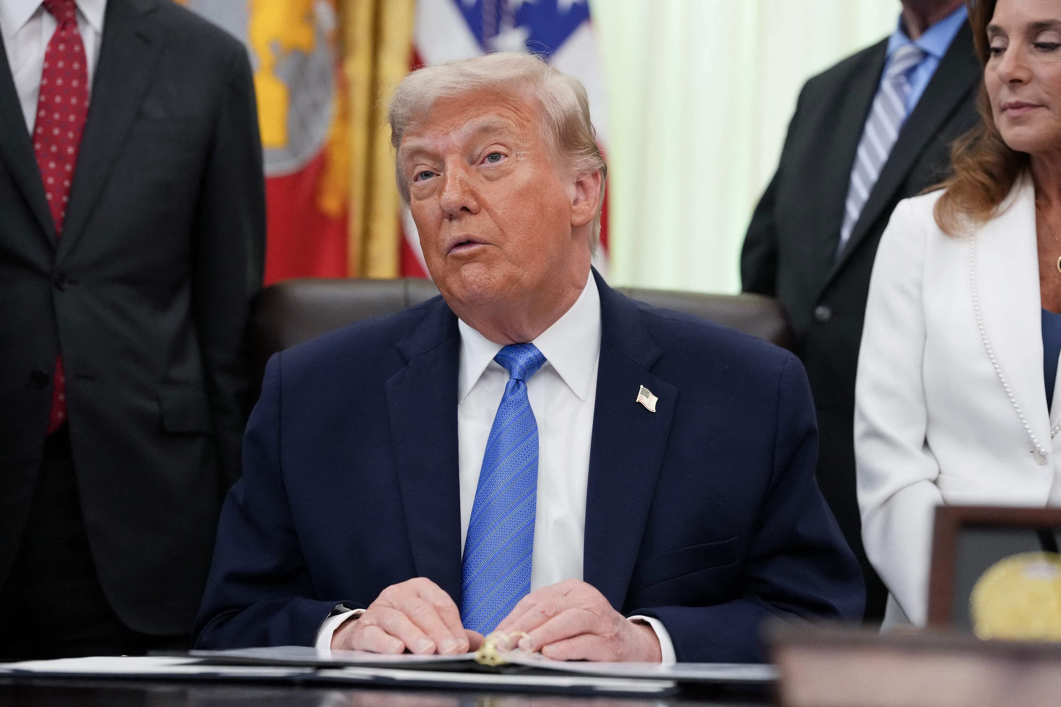 US President Donald Trump signs the “Secure America Act” in June, securing billions in funding for his immigration crackdown. Photo: AFP