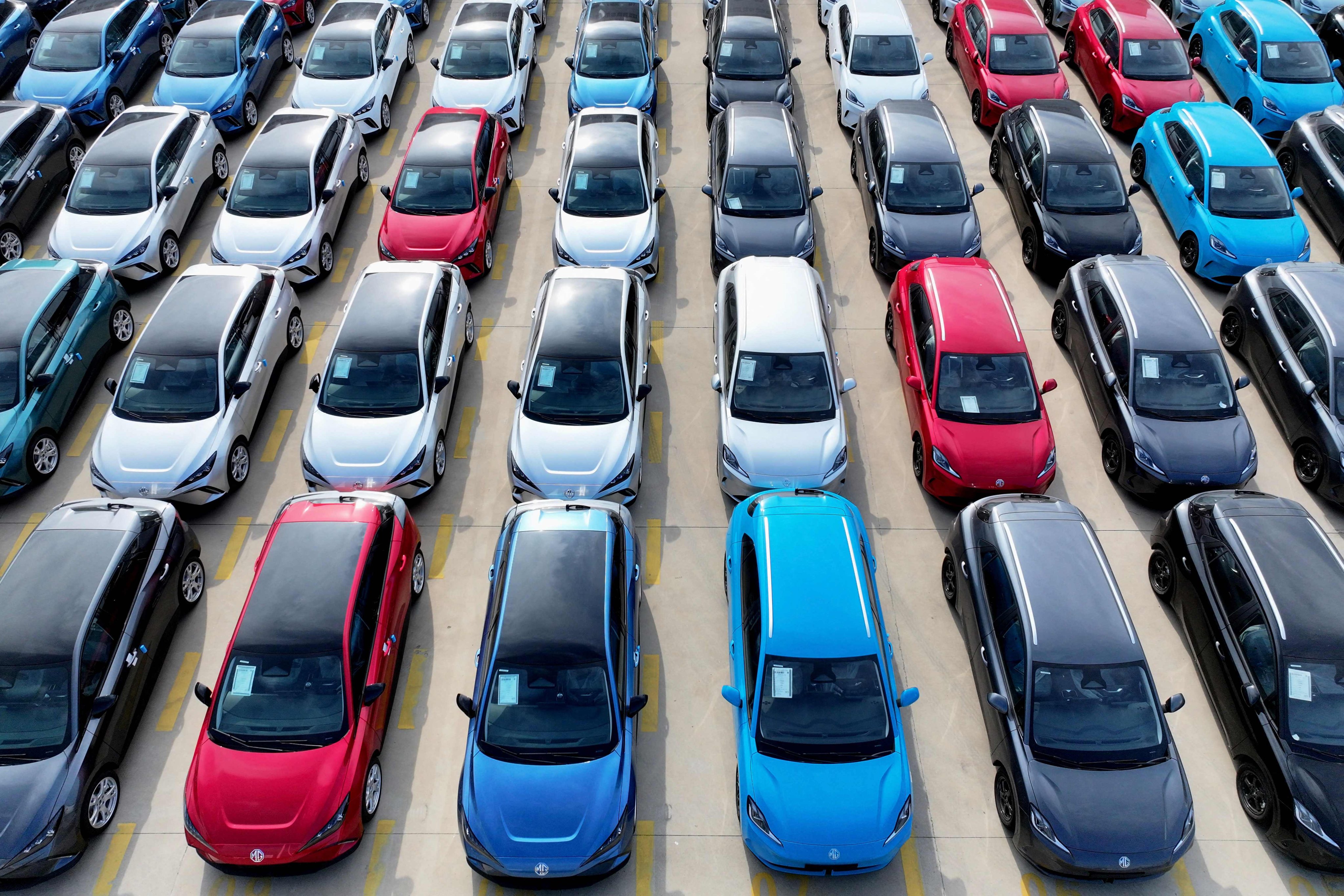 Chinese-made MG cars await loading for export at Lianyungang Port, Jiangsu province, on August 4. Photo: AFP