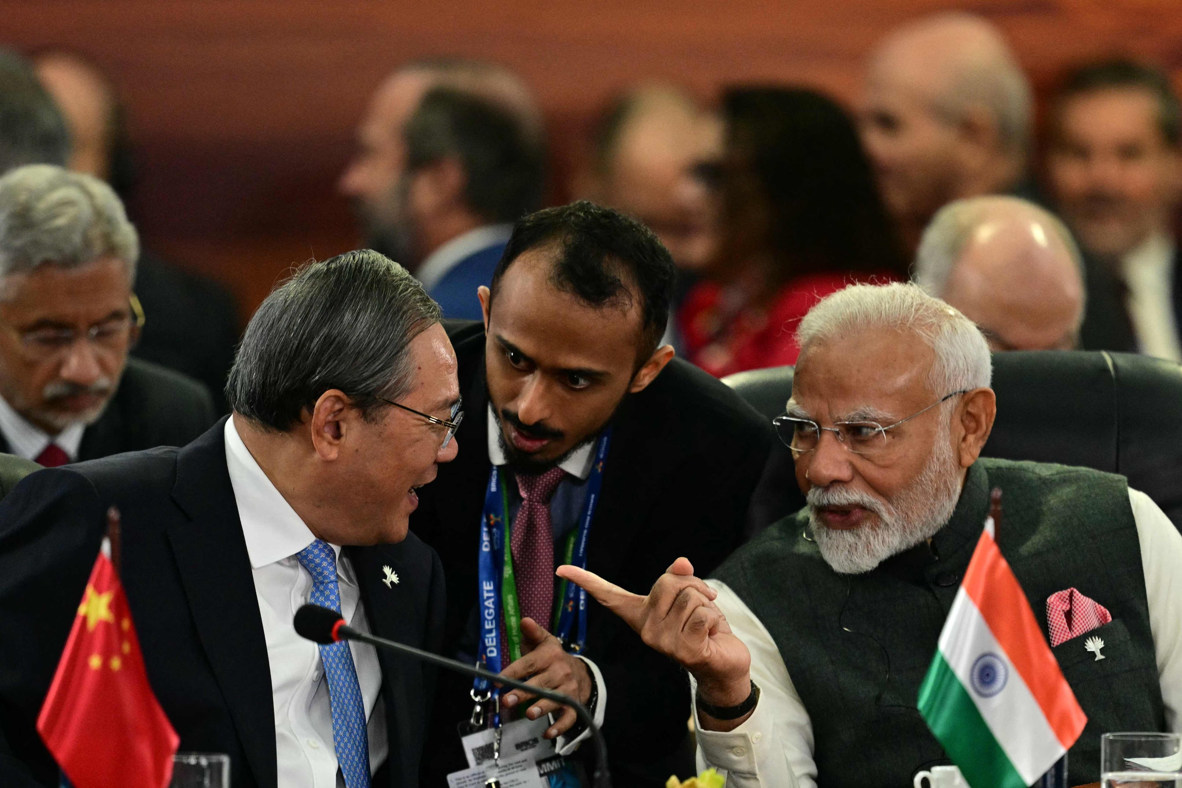 China’s Premier Li Qiang (left) with India’s Prime Minister Narendra Modi (right) during a plenary session of the Brics summit in Rio de Janeiro, Brazil, in July 2025. Photo: AFP