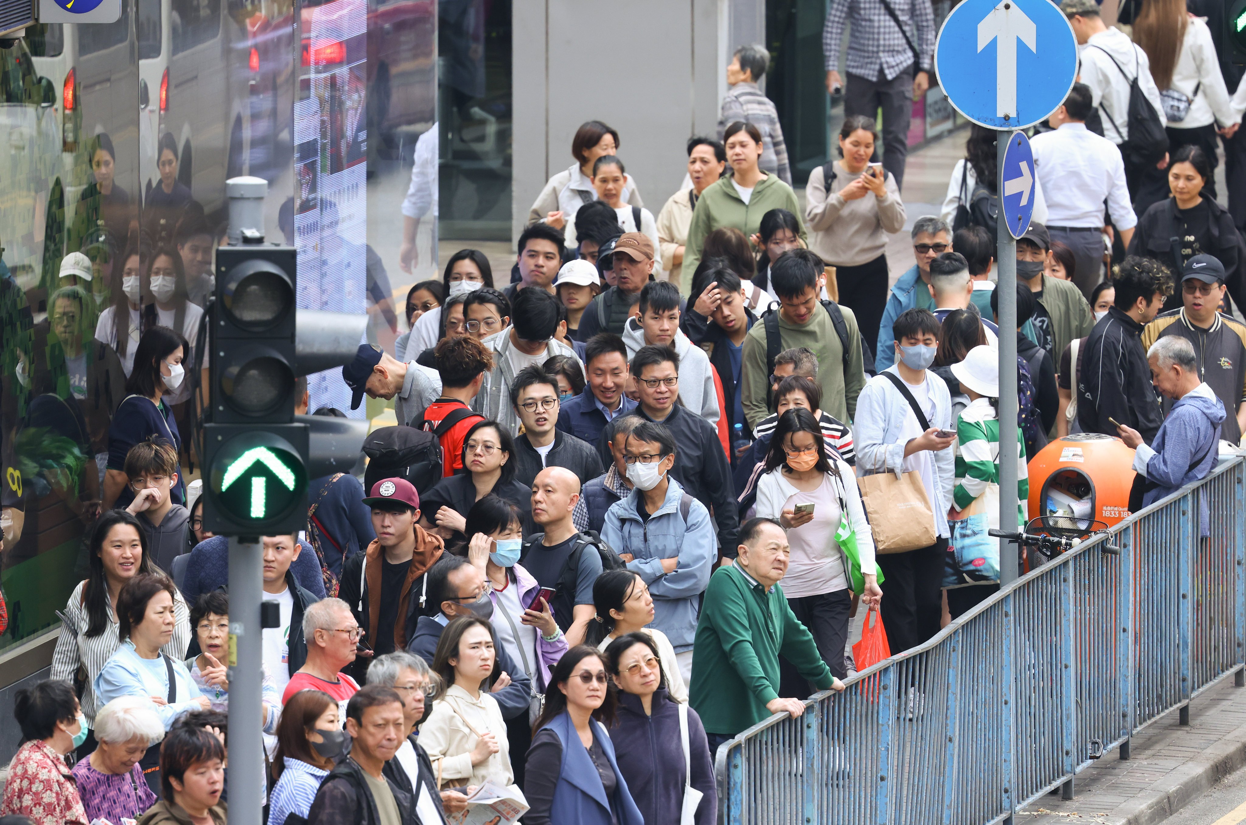People fill the streets in Kwun Tong at lunchtime. In driving economic innovation, the protection of human capital, and mental health, is strategic. Photo: Dickson Lee