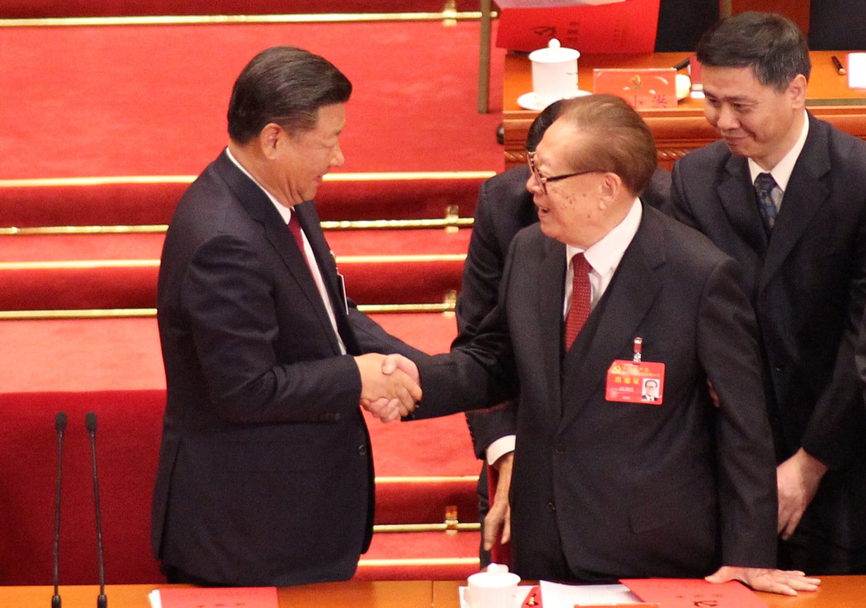 Chinese President Xi Jinping (left) shakes hands with former leader Jiang Zemin at the 19th party congress in 2017. Photo: Simon Song