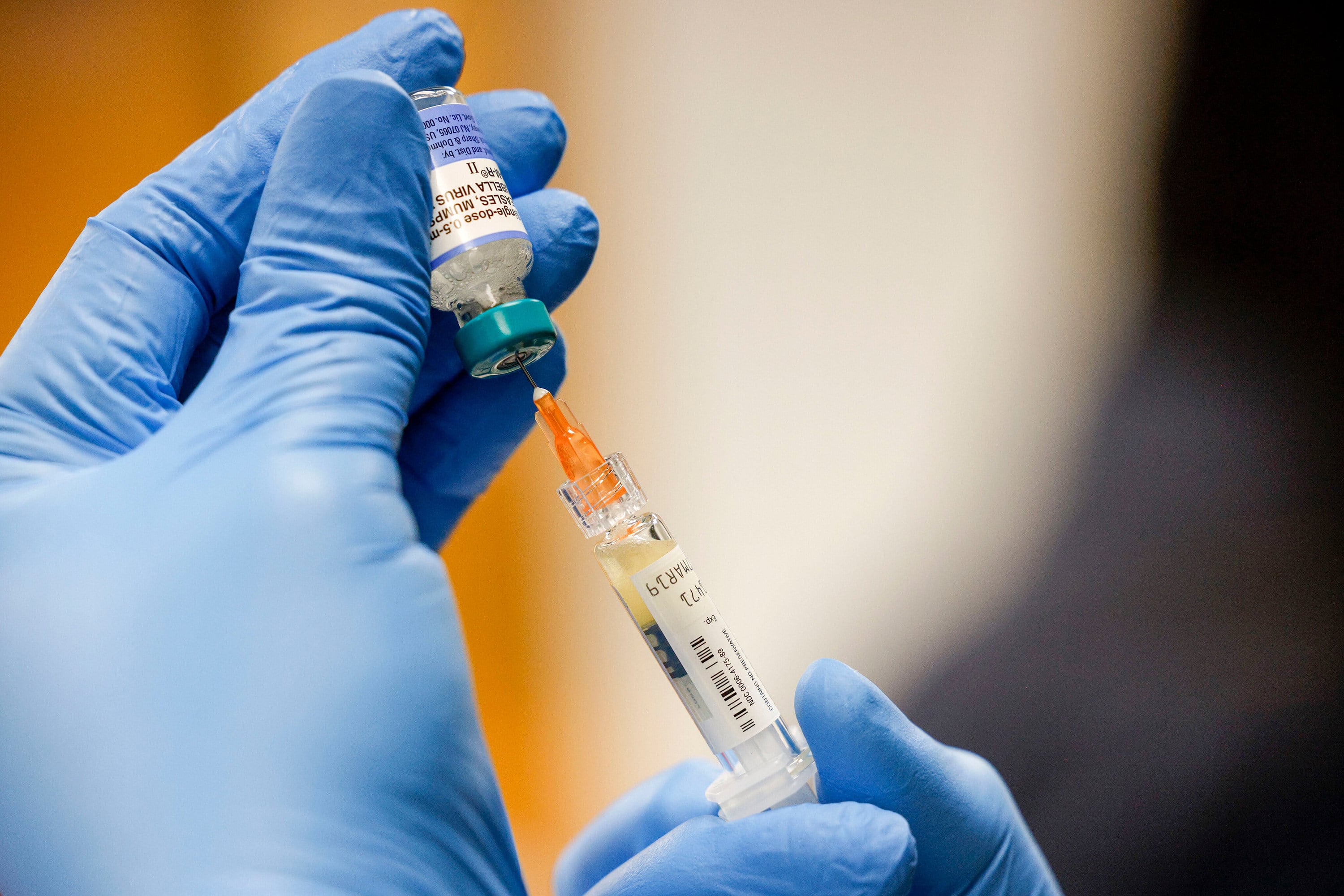 A nurse mixes a dose of the measles, mumps and rubella virus vaccine at a pop-up clinic  in Carrollton, Texas. Photo: TNS