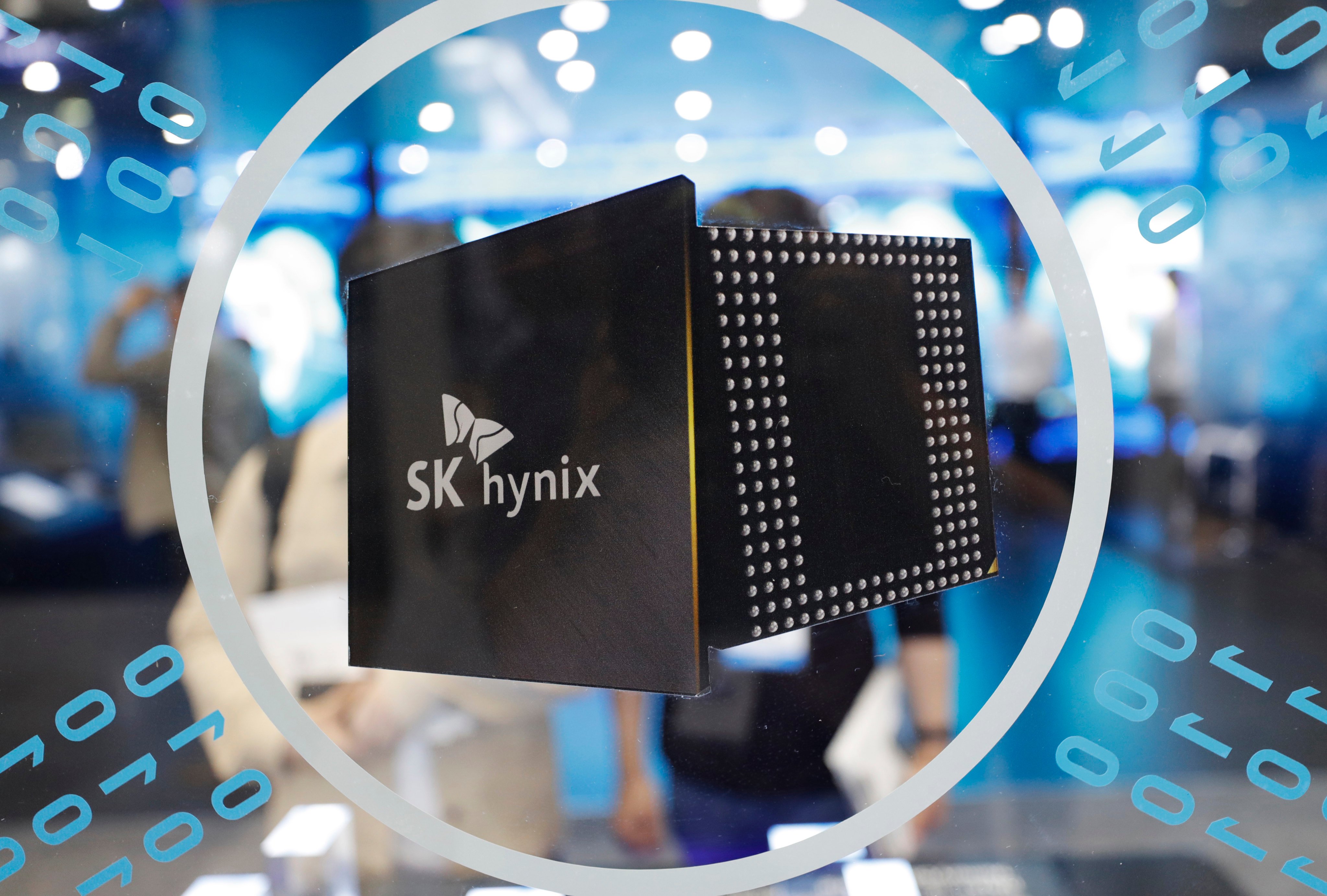 The SK Hynix logo is displayed at a trade expo in South Korea. The company is reportedly looking to sell one of its Chinese facilities. Photo: AP