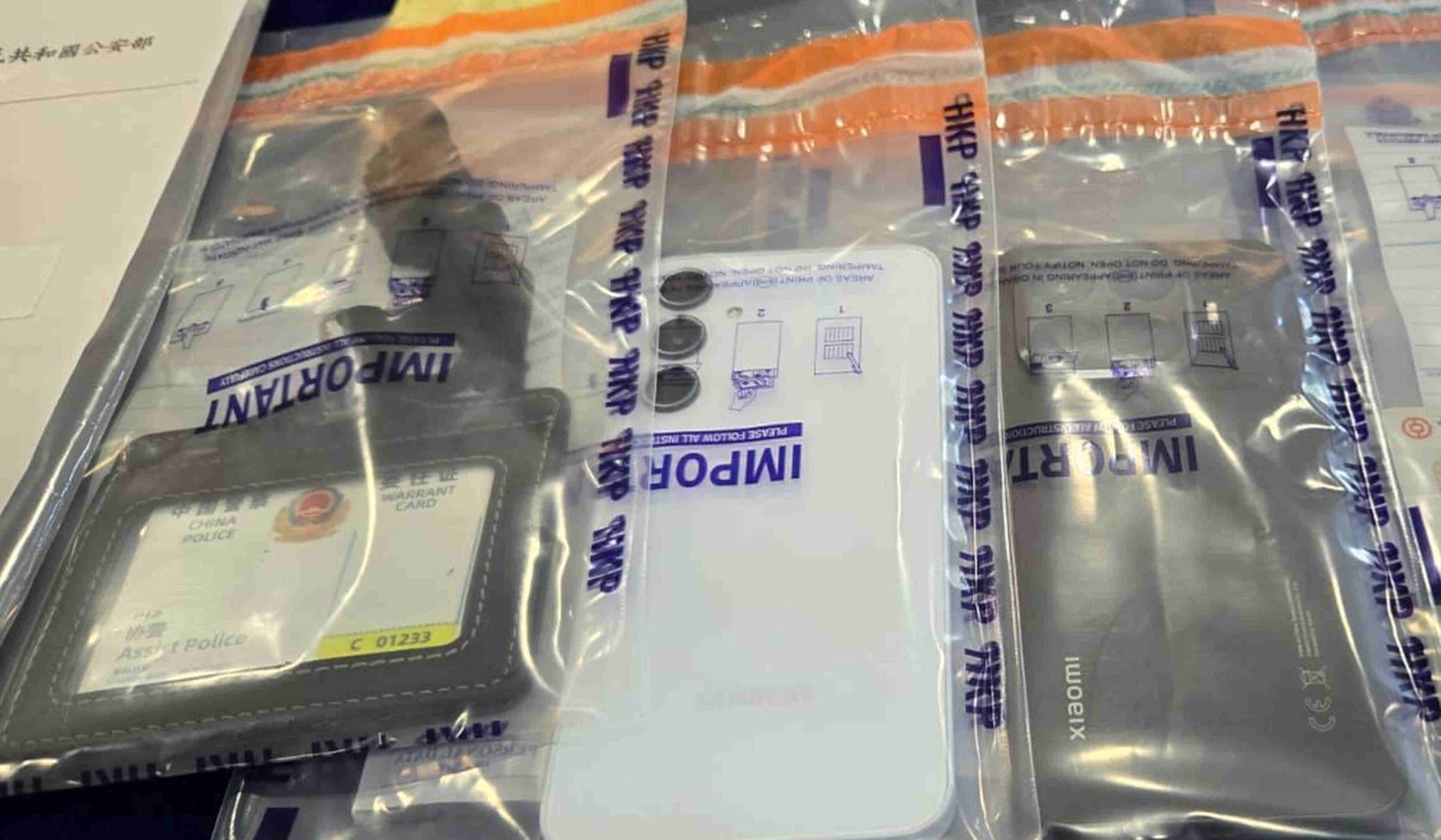A fake identity document for a mainland law enforcement official was among items seized. Photo: Handout