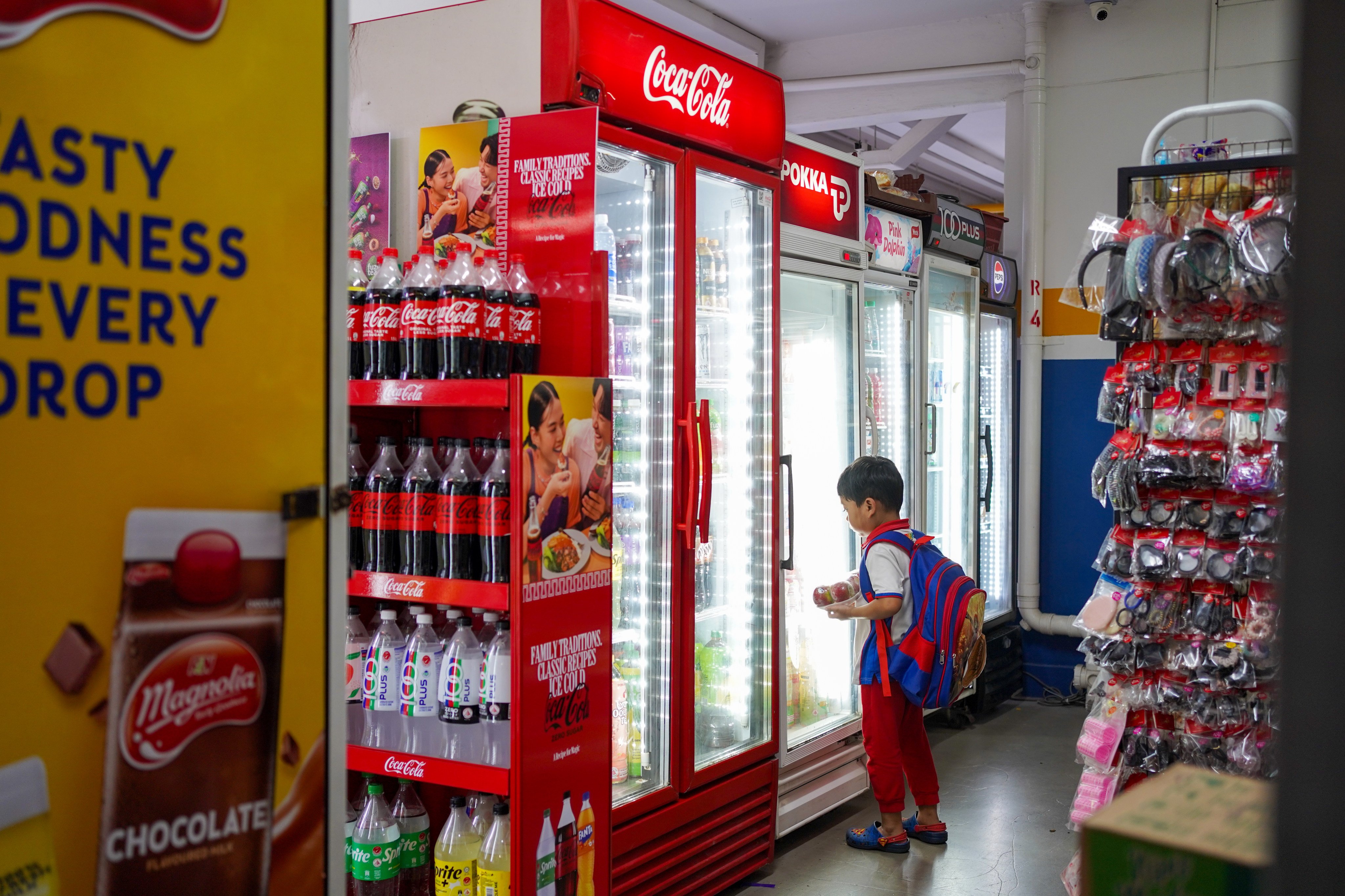 Provision shops, which are typically located on the ground level of public housing blocks in Singapore, serve a broader purpose beyond customer engagement. Photo: Kolette Lim