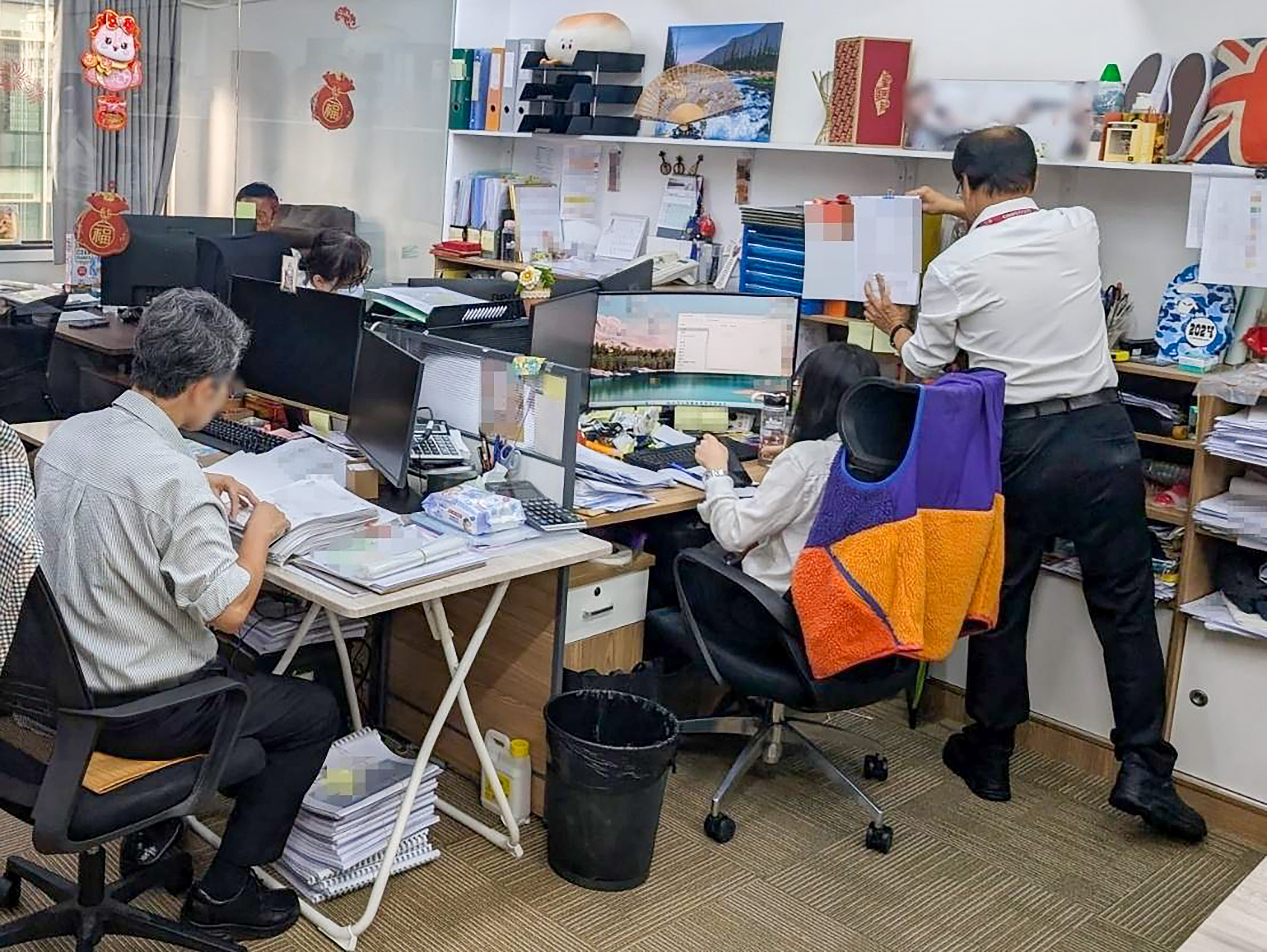 Authorities conducted searches at 12 premises on Wednesday pertaining to a bid-rigging case involving 28 estates and contracts valued at around HK$500 million. Photo: Competition Commission