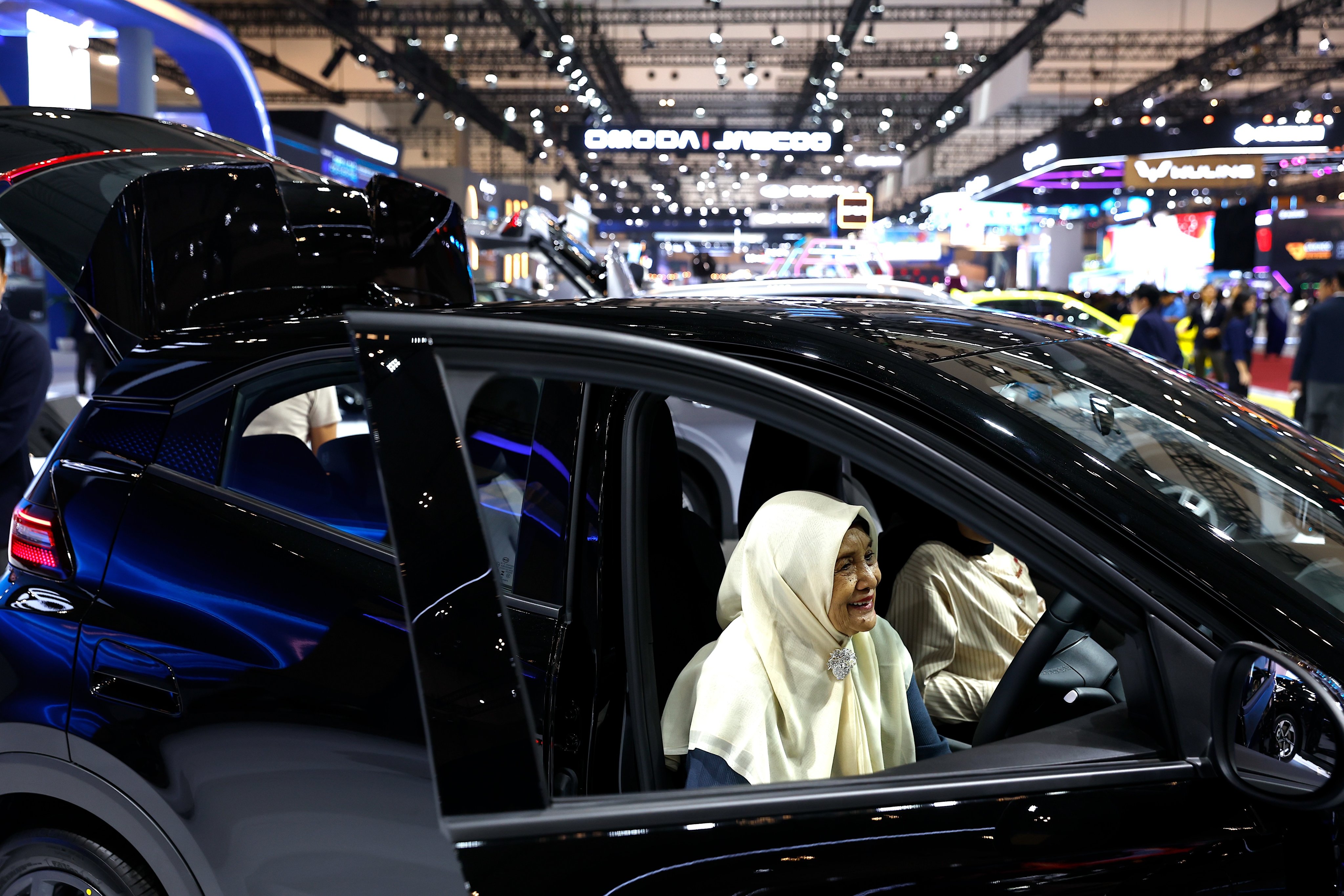Visitors at the Gaikindo Indonesia International Auto Show 2026 in Tangerang, Indonesia’s Banten province in July. Indonesia is currently ​building a huge factory complex to manufacture electric cars in the Subang region of West Java province. Photo: EPA