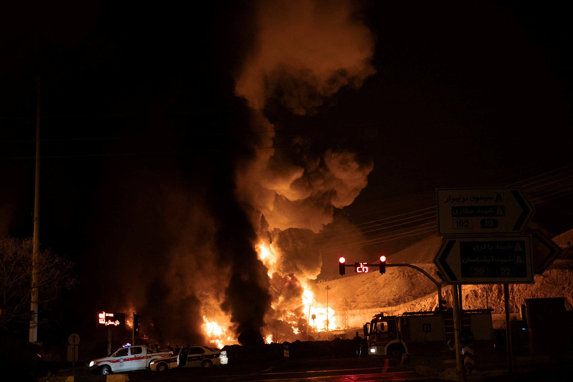 Flames and smoke rise at the site of a strike carried out during the 40-day US-Israeli conflict with Iran, in Tehran, in March-April. Photo: Reuters