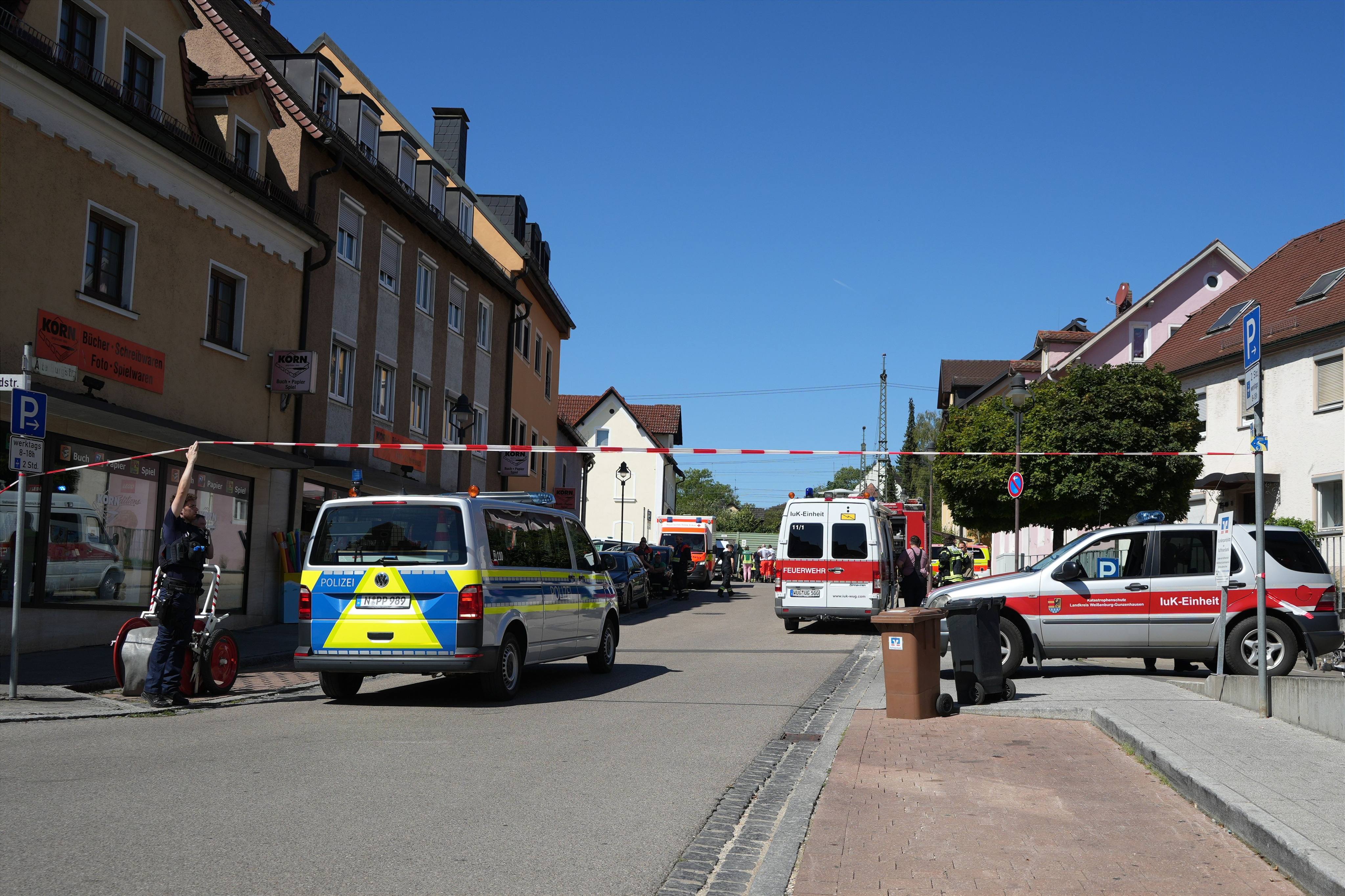 Police officers cordon off a wide area around the train station in Middle Franconia, where a technician had discovered the object in the track bed at the entrance to the city’s train station. Photo: dpa