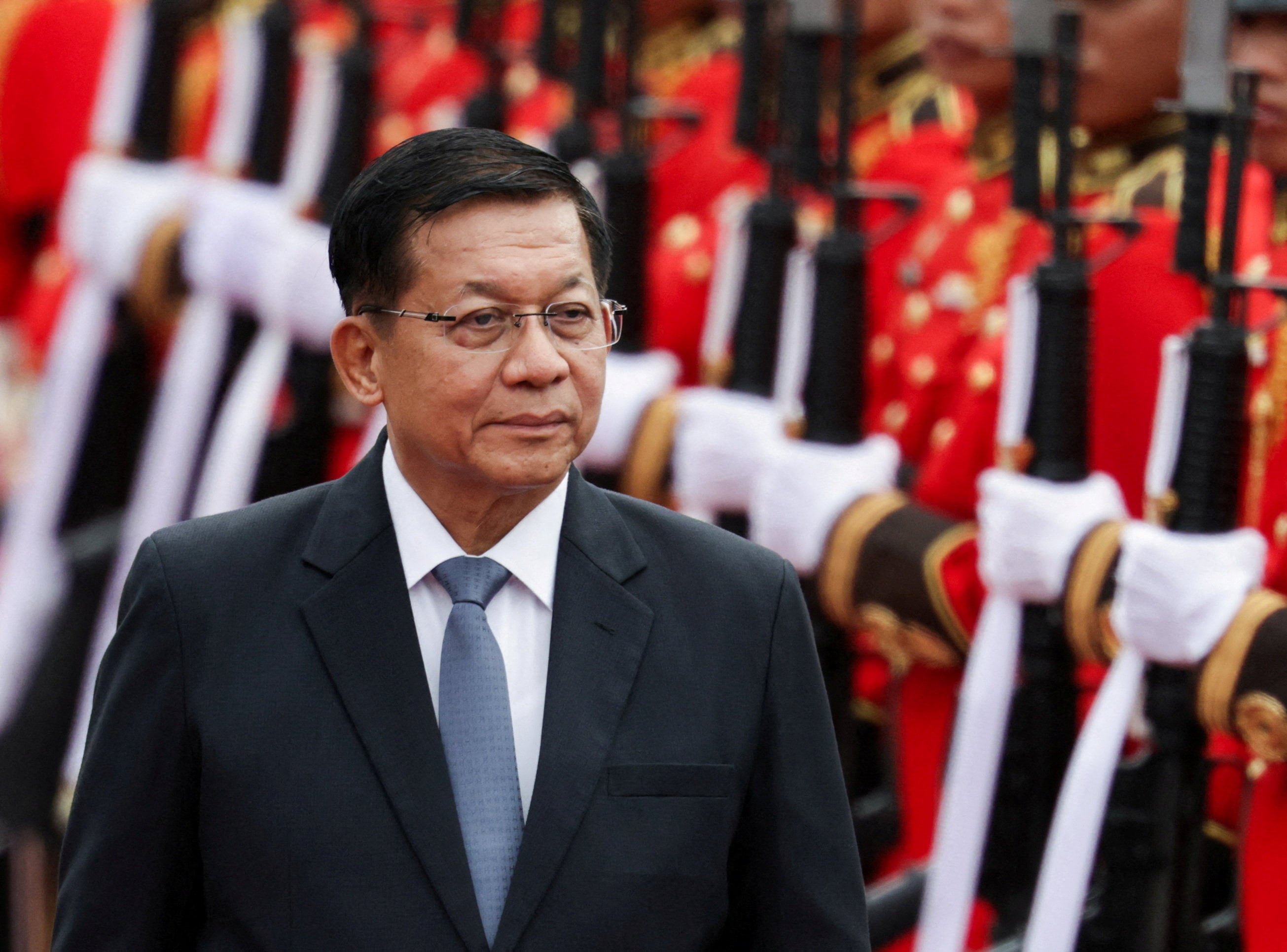 Myanmar’s President Min Aung Hlaing reviews a Thai guard of honour during a welcome ceremony at Bangkok’s  Government House on August 6. Photo: Reuters