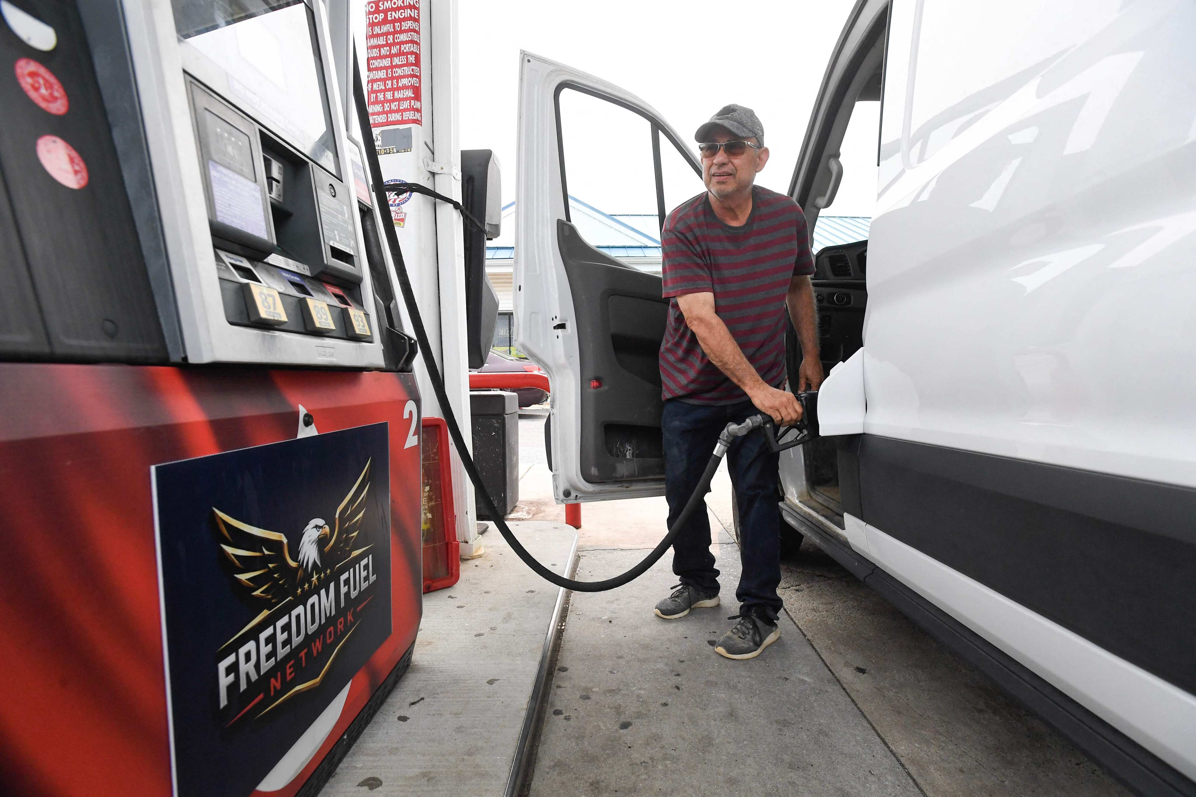 A customer refuels his van at a petrol station in Boothwyn, Pennsylvania, last month. Photo: AFP