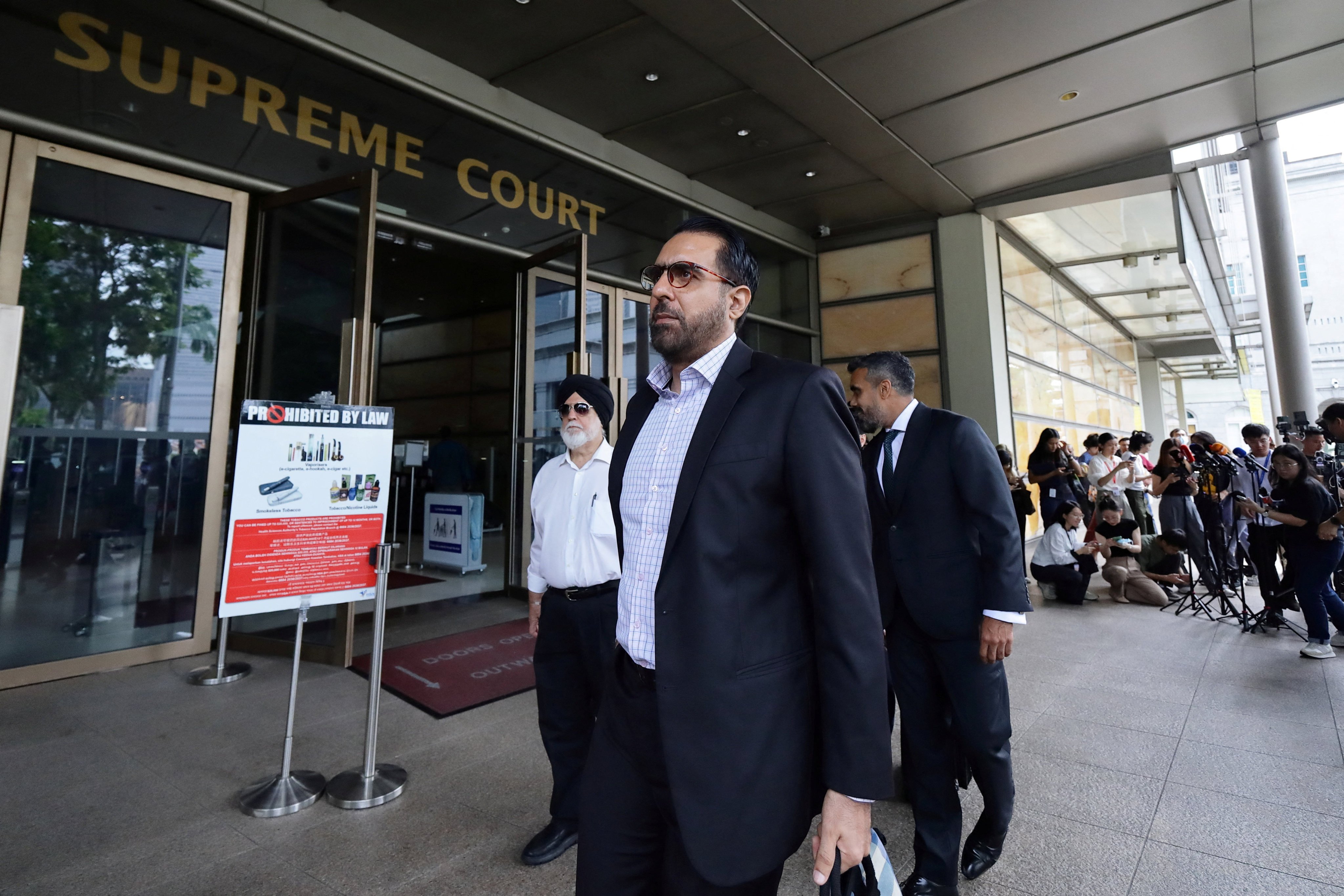 Then leader of the opposition Pritam Singh leaves the Supreme Court after his appeal was dismissed in Singapore in December. Photo: Reuters