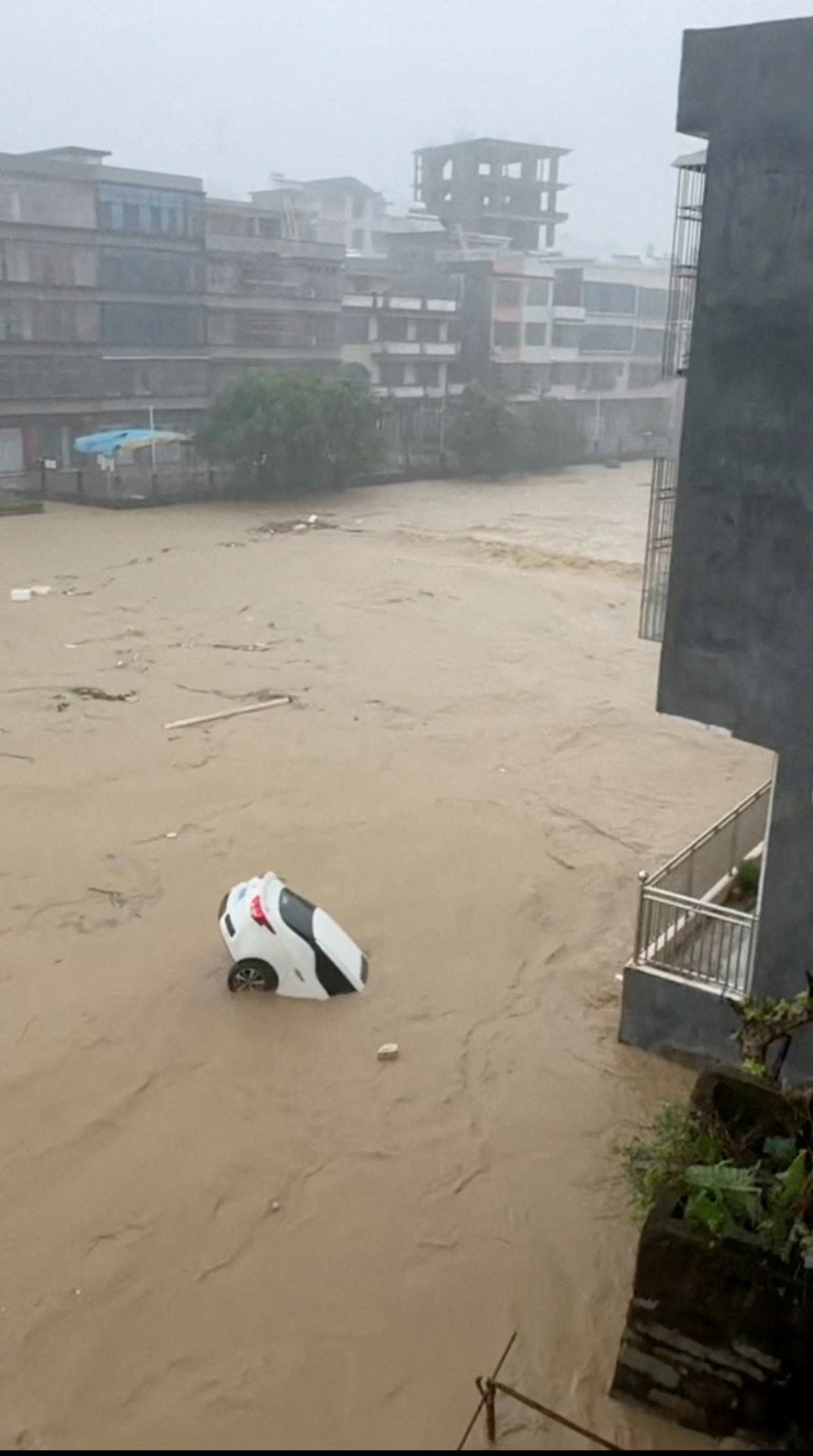 scmp.com - Mia Nurmamat - South China tech hub's wet summer puts damper on small business profits