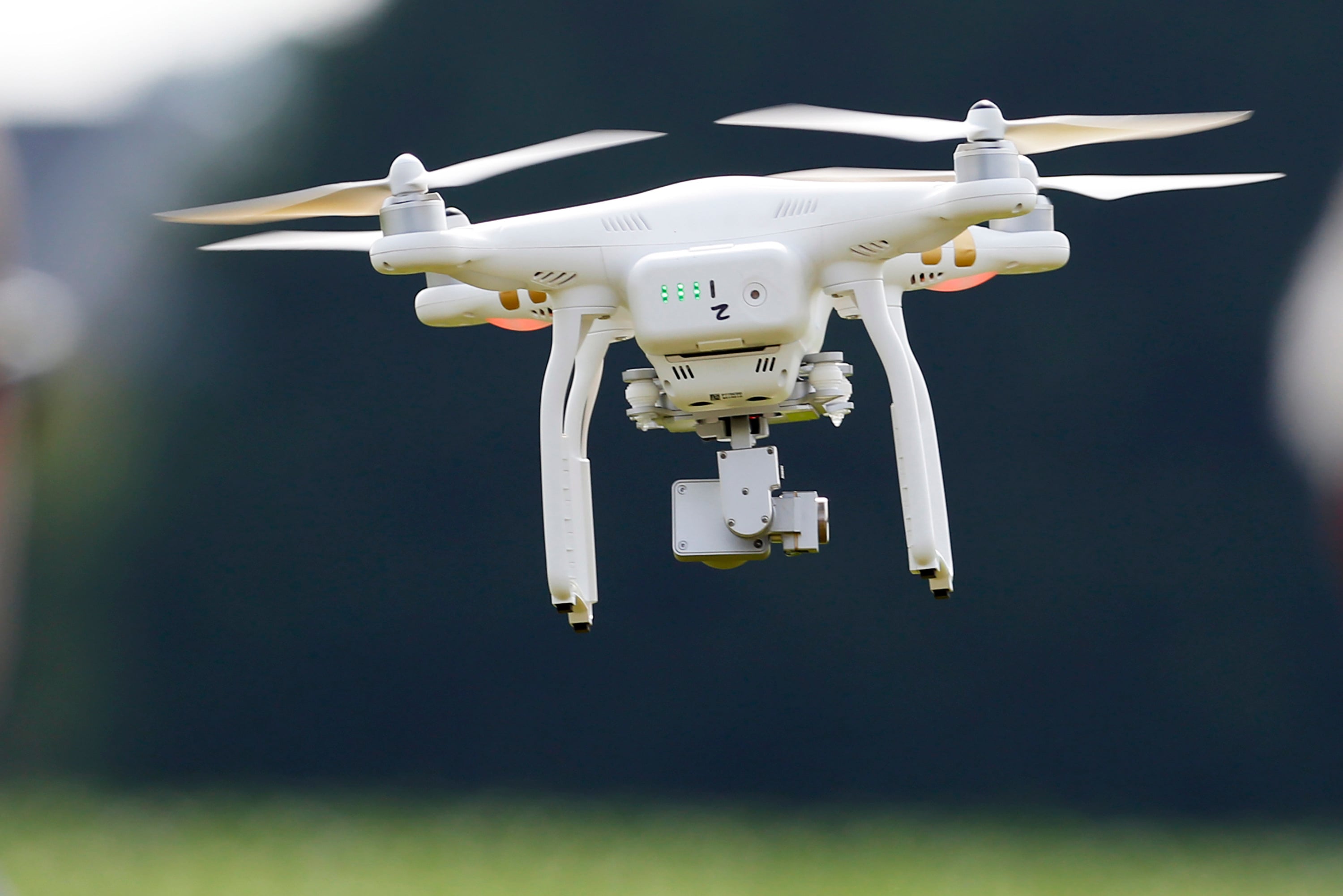 A DJI Phantom 3 drone flies during a demonstration at a farm and winery in the US state of Maryland in 2015. New restrictions on the drone trade could curb the number of Chinese drones entering the United States. Photo: AP