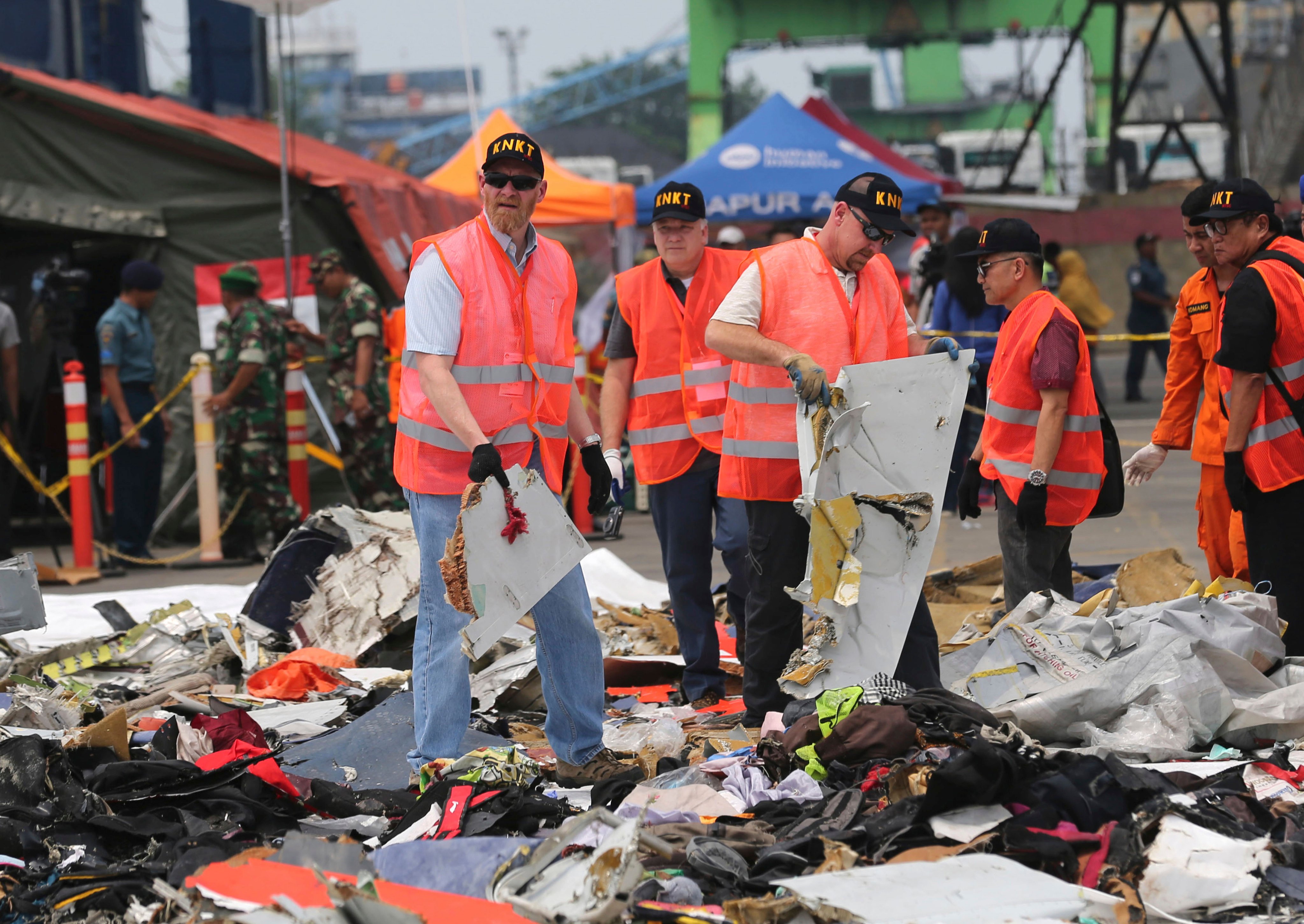 US investigators examine parts recovered from the crash of Lion Air flight 610 at Tanjung Priok Port in Jakarta in 2018. Photo: AP