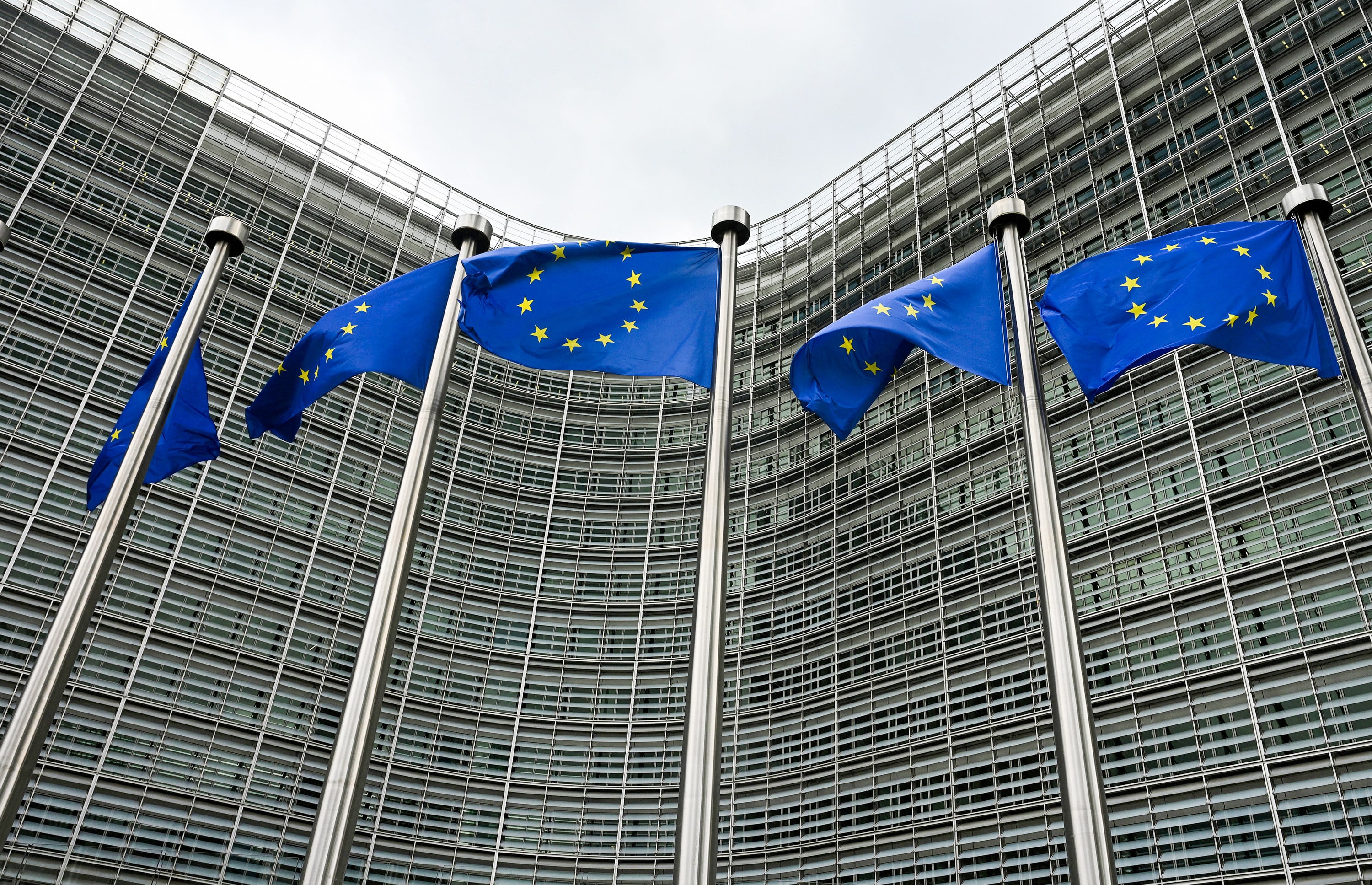 European Union flags fly in front of the Berlaymont building, the EU Commission headquarters, in Brussels on June 9, 2026. Photo: TNS
