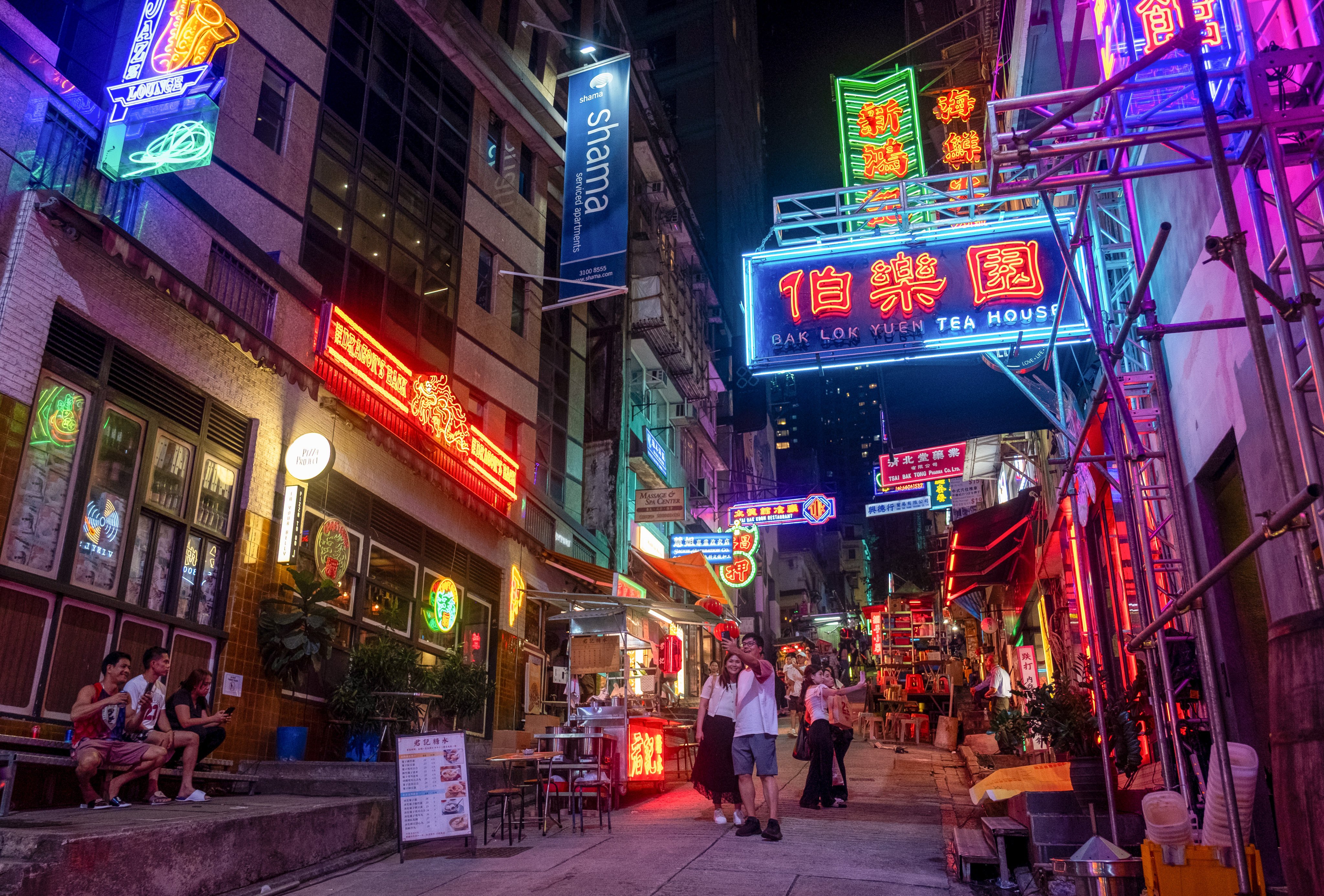 Hong Kong’s disappearing neon signs and outdoor dai pai dong have been recreated in Peel Street for a new movie starring British actor Henry Cavill. Photo: Connor Mycroft