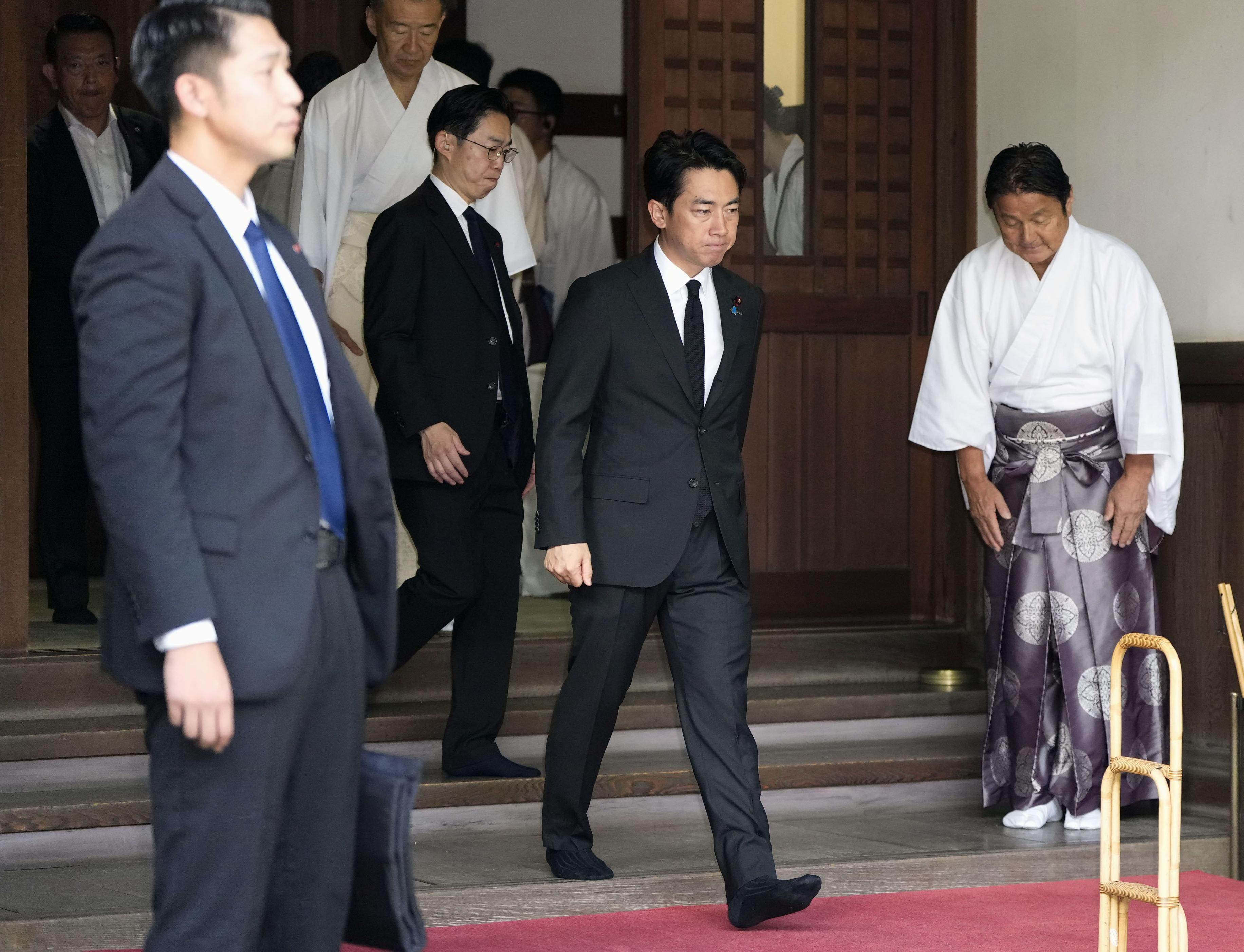 Japanese Defence Minister Shinjiro Koizumi (centre) visits the controversial Yasukuni Shrine in Tokyo on August 15, 2026. Photo: Kyodo