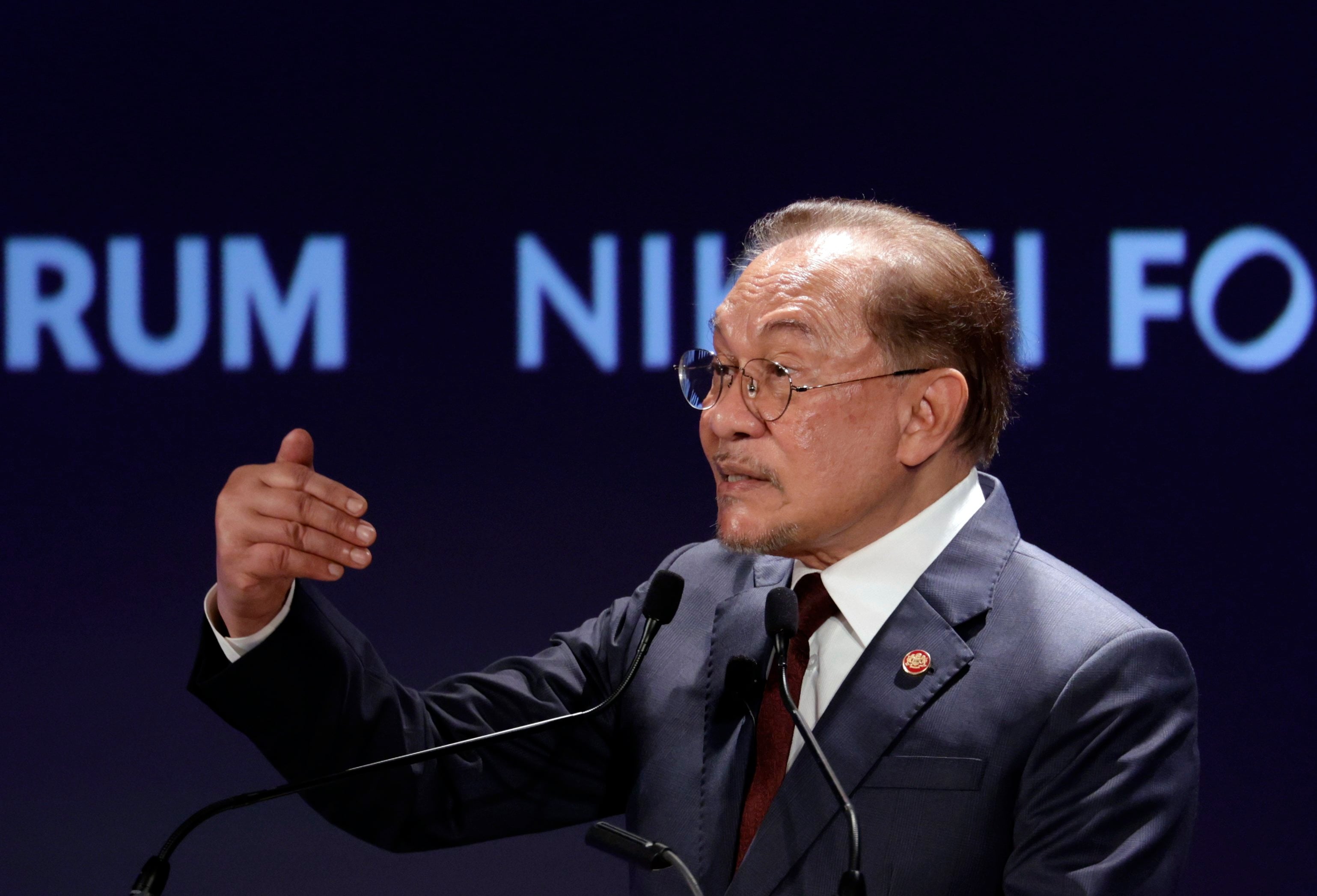 Malaysia’s Prime Minister Anwar Ibrahim speaks during a forum in Tokyo in June. Photo: EPA