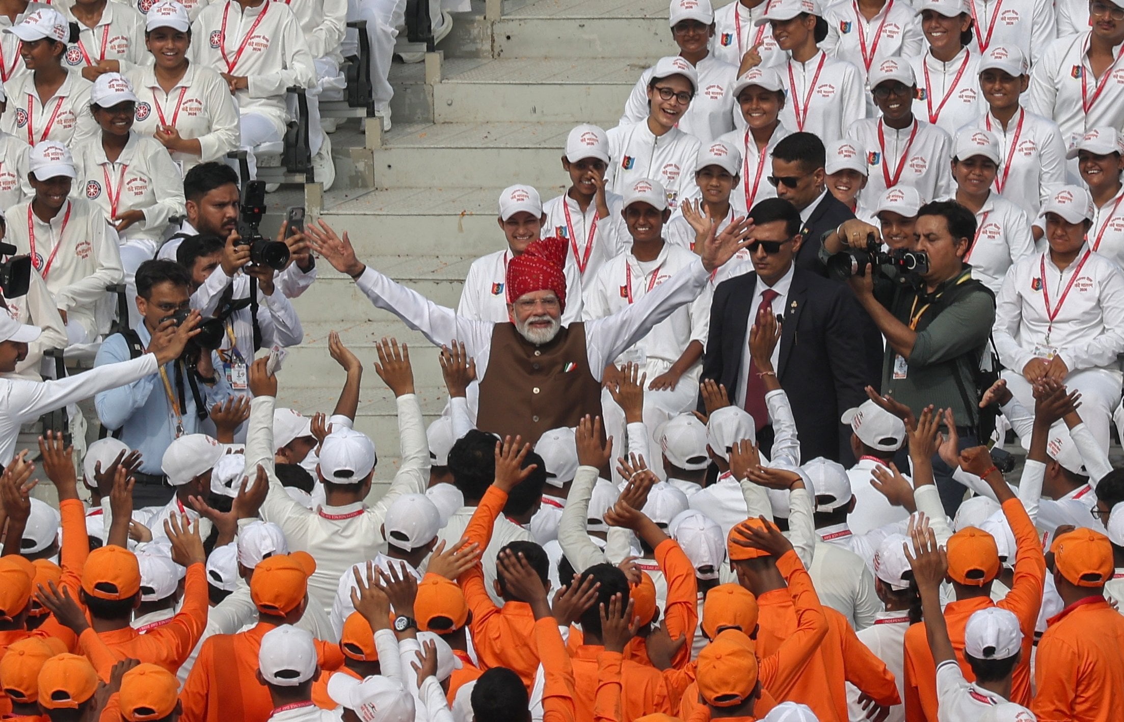 Indian Prime Minister Narendra Modi (middle) greets school children after addressing the nation during Independence Day celebrations at the Red Fort in New Delhi on Saturday. Photo: EPA