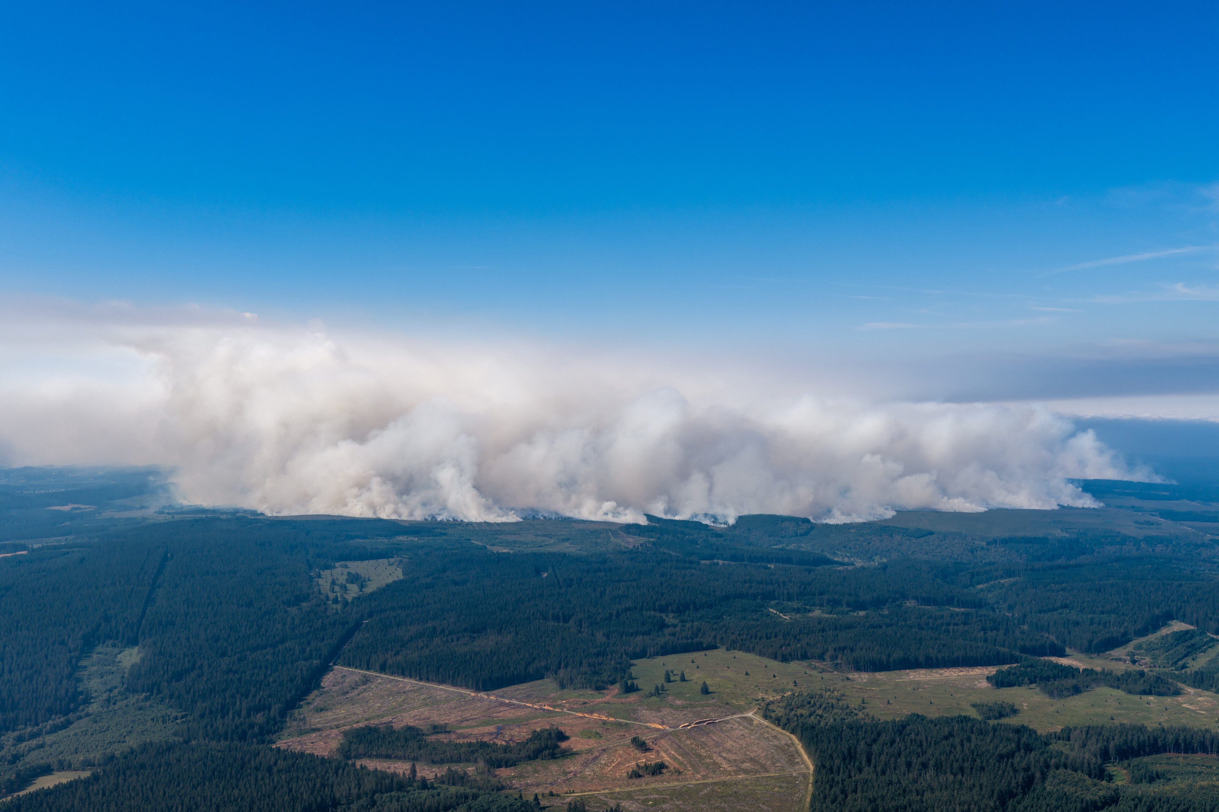 Smoke from a massive wildfire in Belgium’s Hohes Venn region is seen from Germany, on Sunday. Photo: dpa