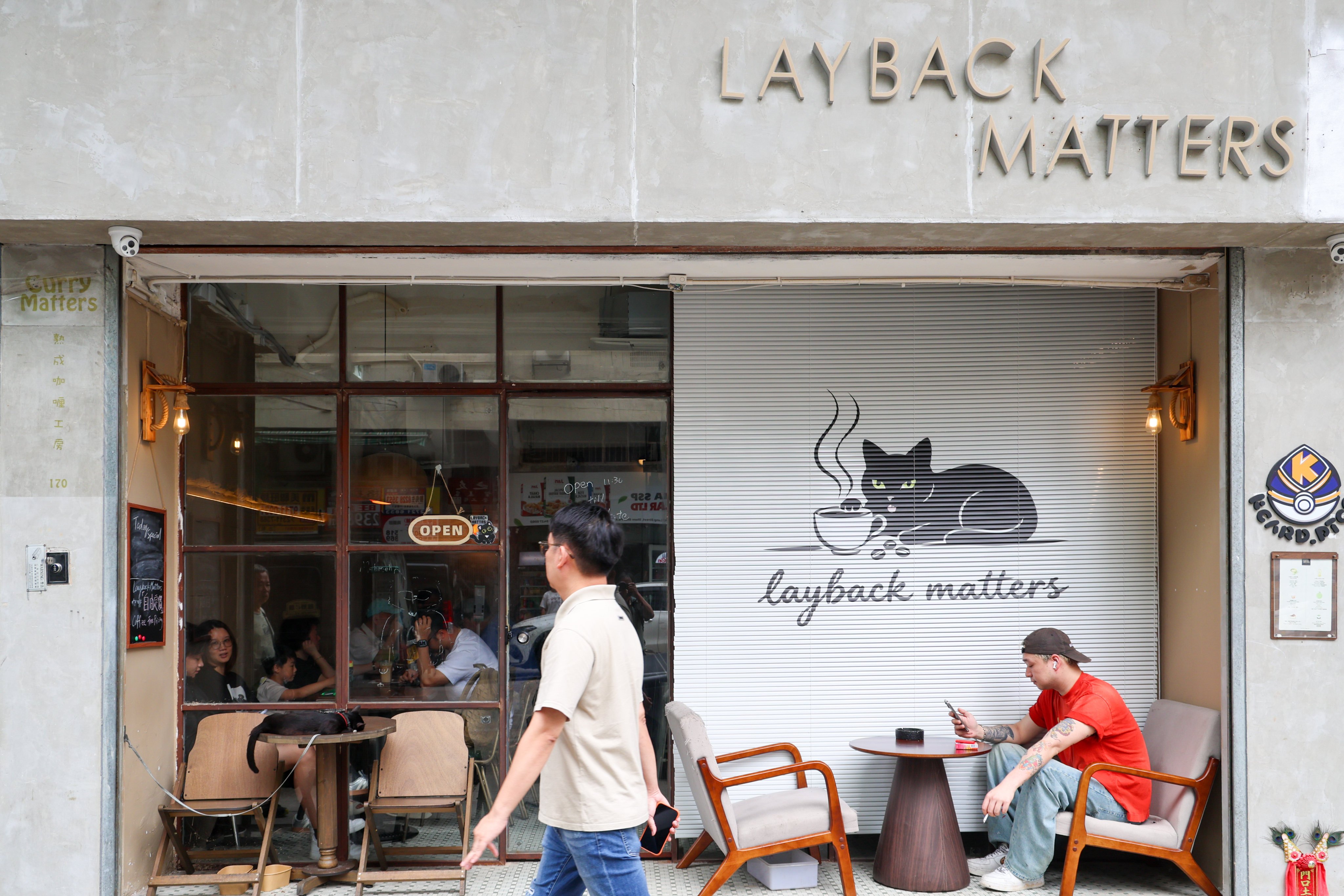Clothing and accessories shops in Sham Shui Po are steadily dwindling, making way for the cafes and art galleries increasingly favoured by young people. Photo: Dickson Lee