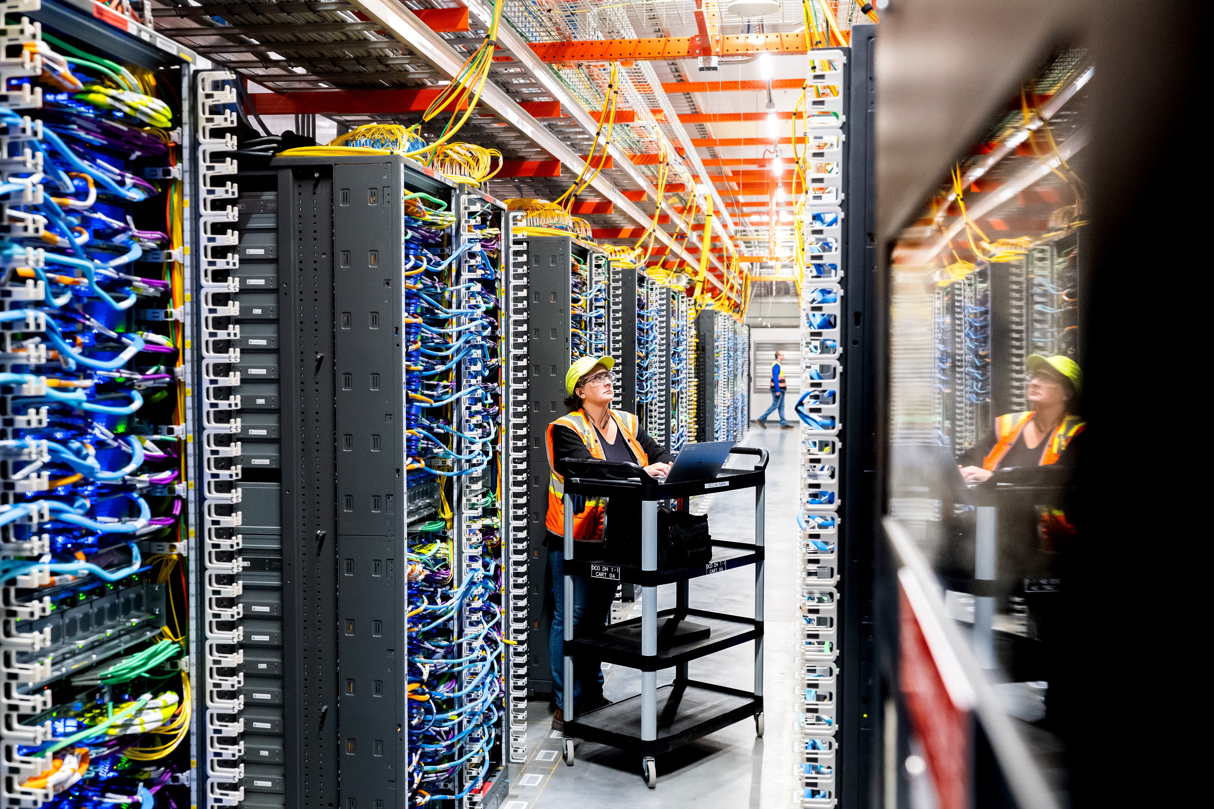 A technician works at an Amazon Web Services AI data centre in the United States. Photo: Getty Images