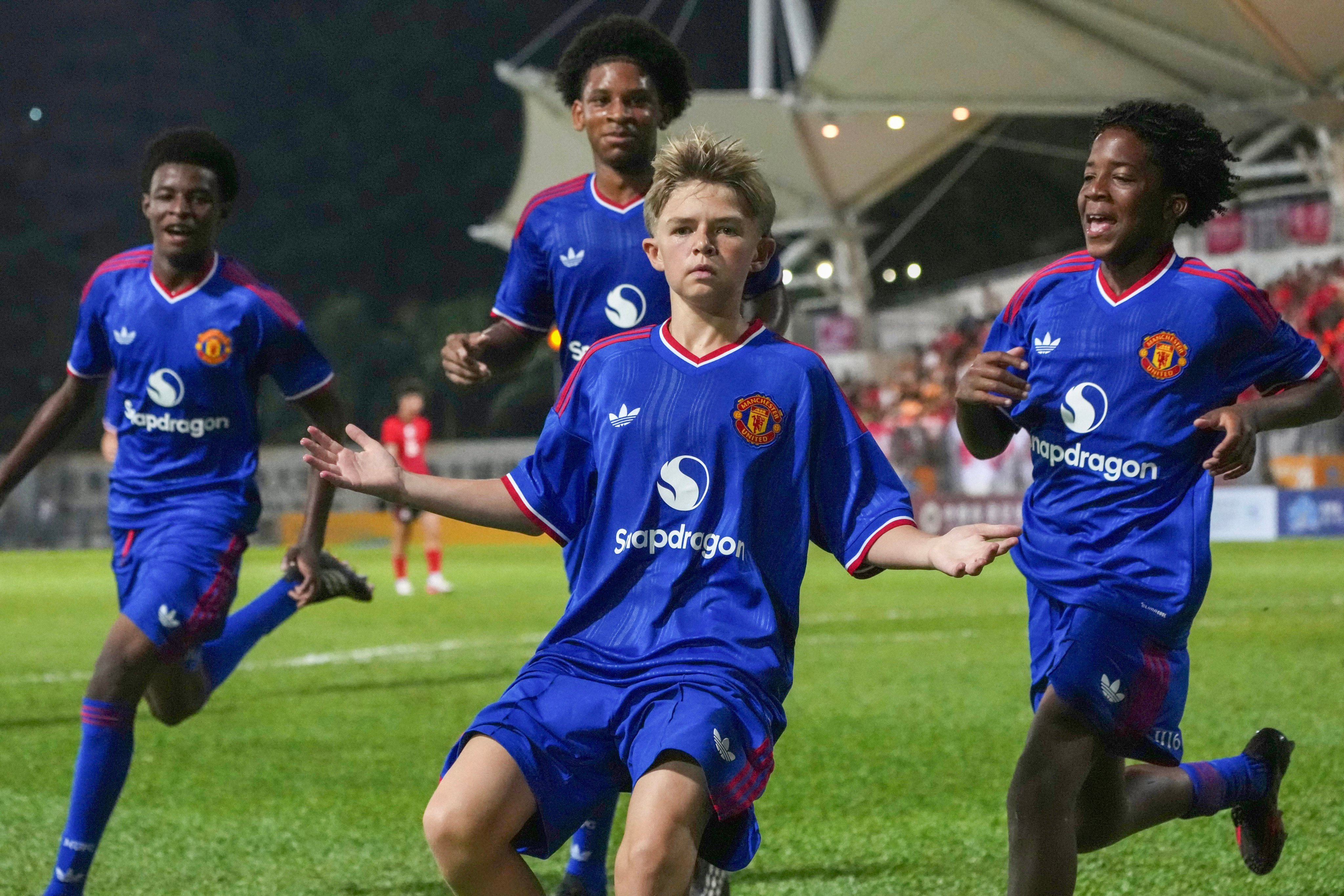Manchester United celebrate their second goal goal against the Hong Kong under-16 team on Sunday. Photo: Karma Lo