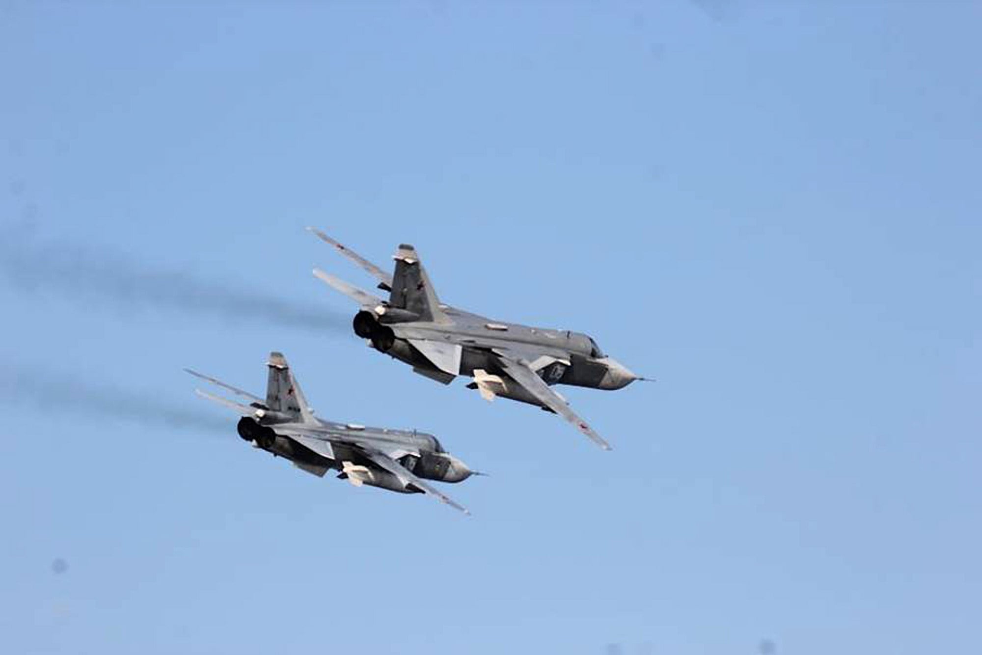 Two Russian Sukhoi Su-24 attack aircraft are seen in the Baltic Sea in April 2016. The Iranian pilots were also flying Su-24s. Photo: US Navy via AP,