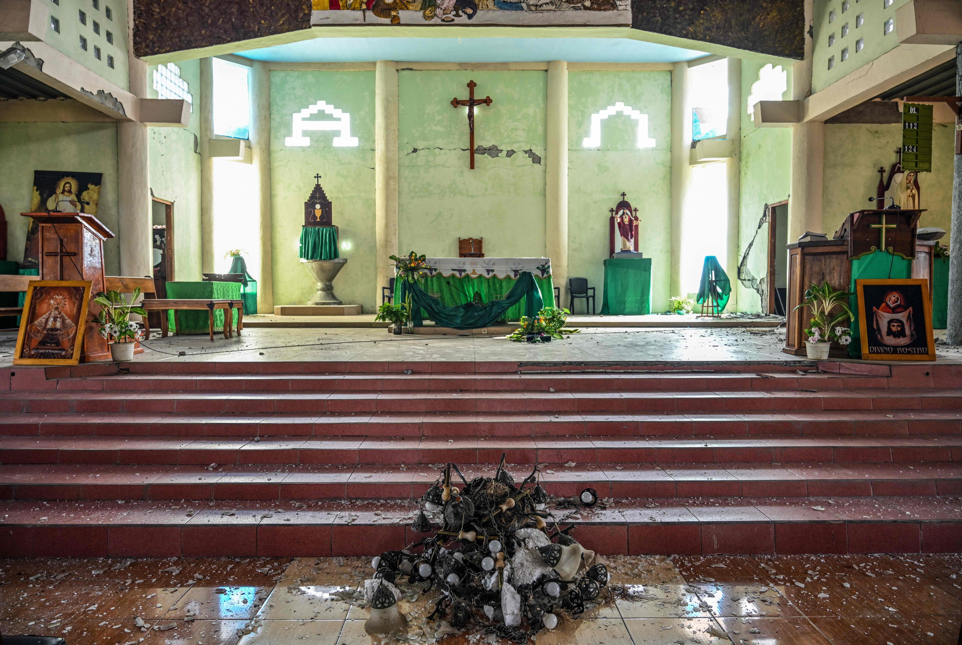Debris is seen inside St Joseph’s Church on Sunday following a 7.7-magnitude earthquake in Kisol, East Nusa Tenggara. Photo: AFP