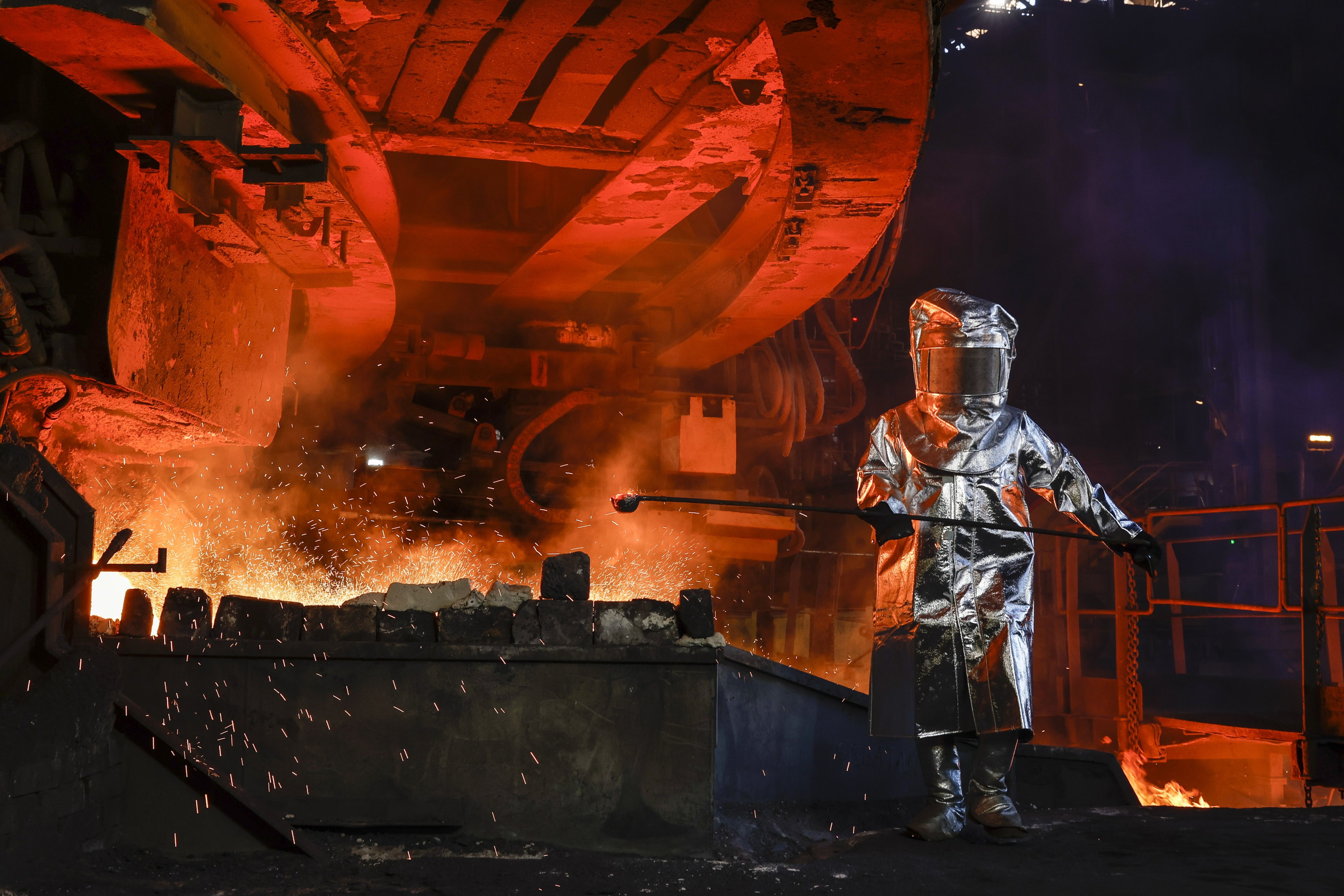A worker conducts a tapping process at a nickel processing plant in Sorowako, South Sulawesi, Indonesia, in February. Photo: EPA