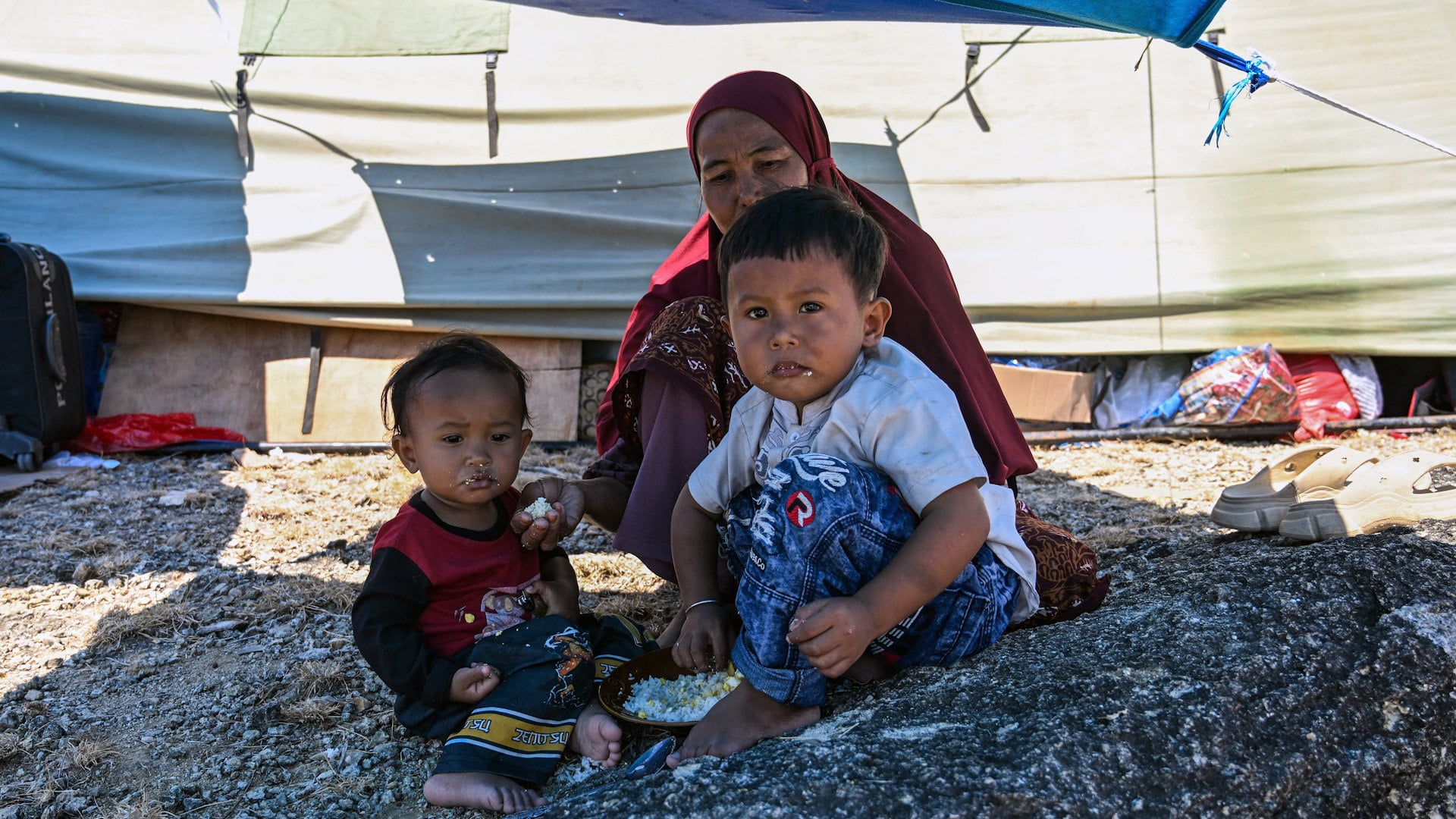 Survivors face aftermath of Indonesian earthquake